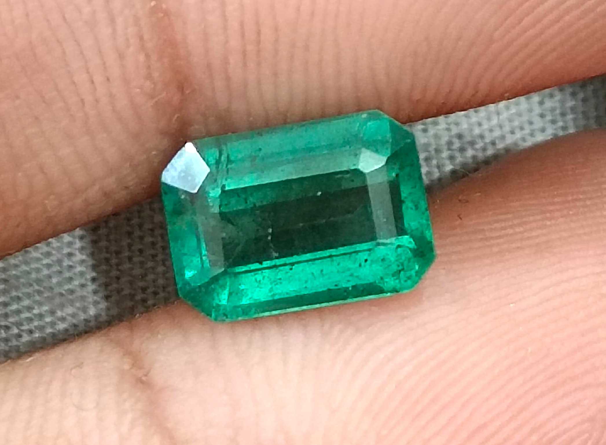 2.32ct Medium light metallic green octagon cut Zambian emerald stone 