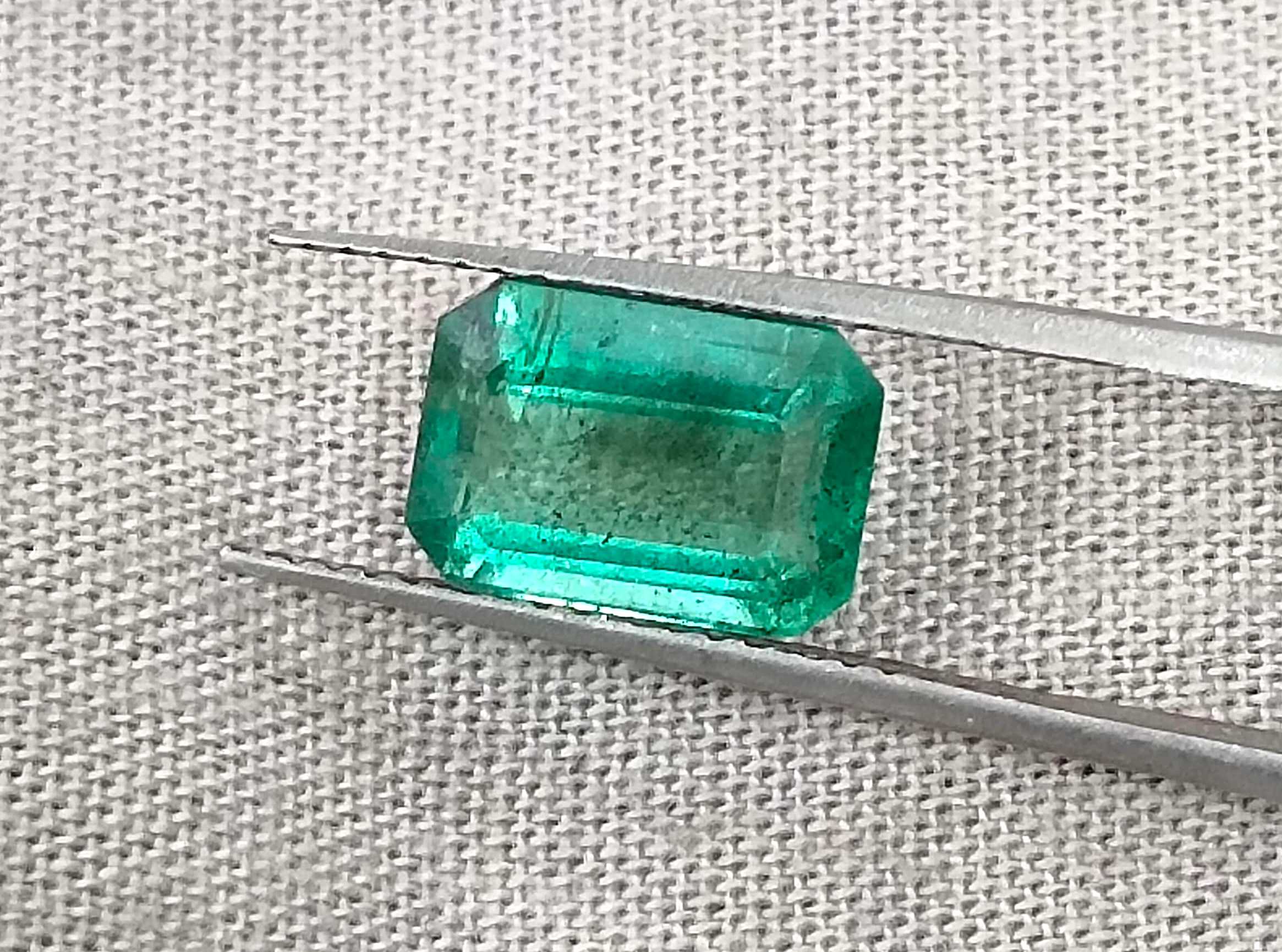 2.32ct Medium light metallic green octagon cut Zambian emerald stone 