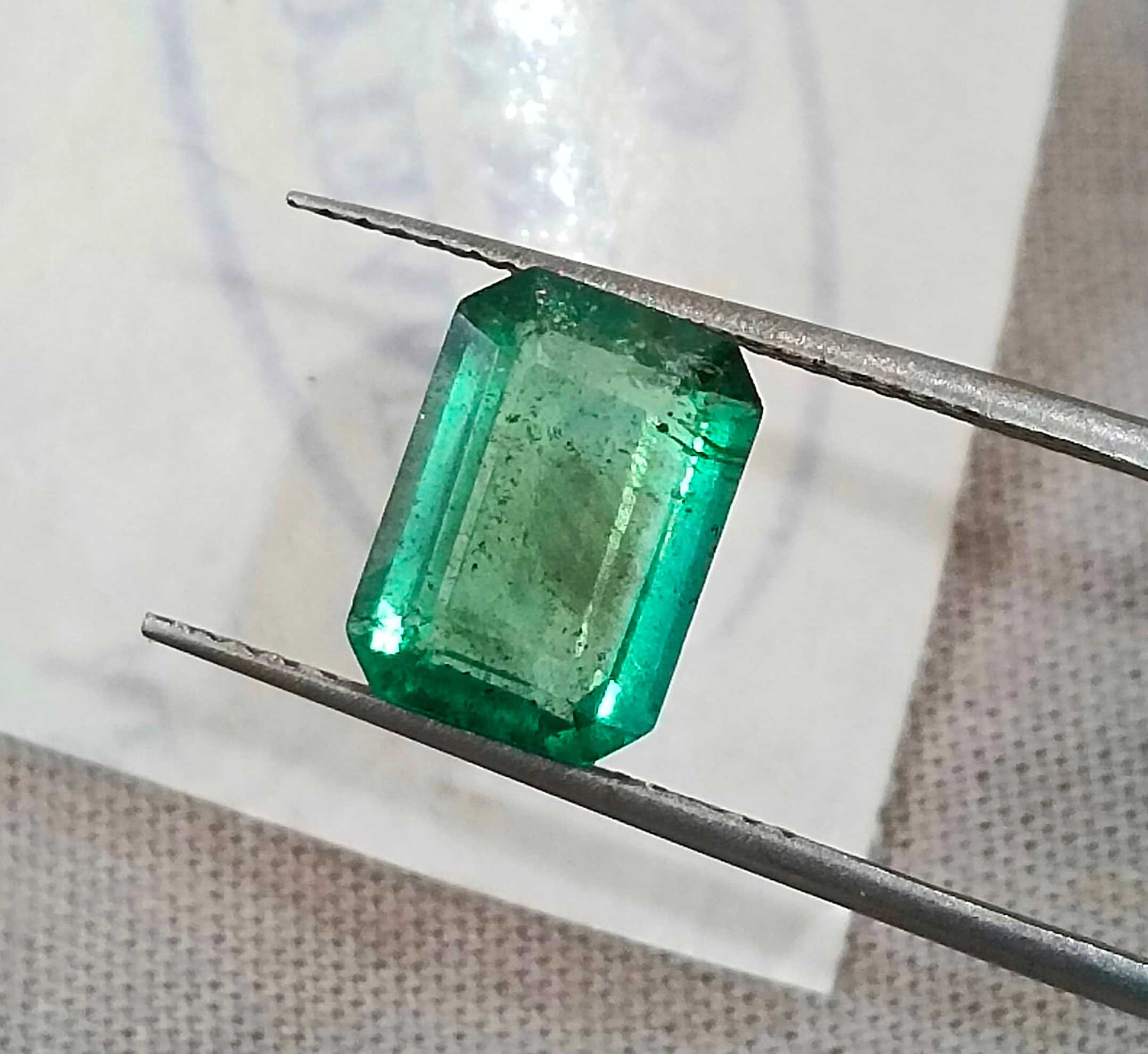 2.32ct Medium light metallic green octagon cut Zambian emerald stone 