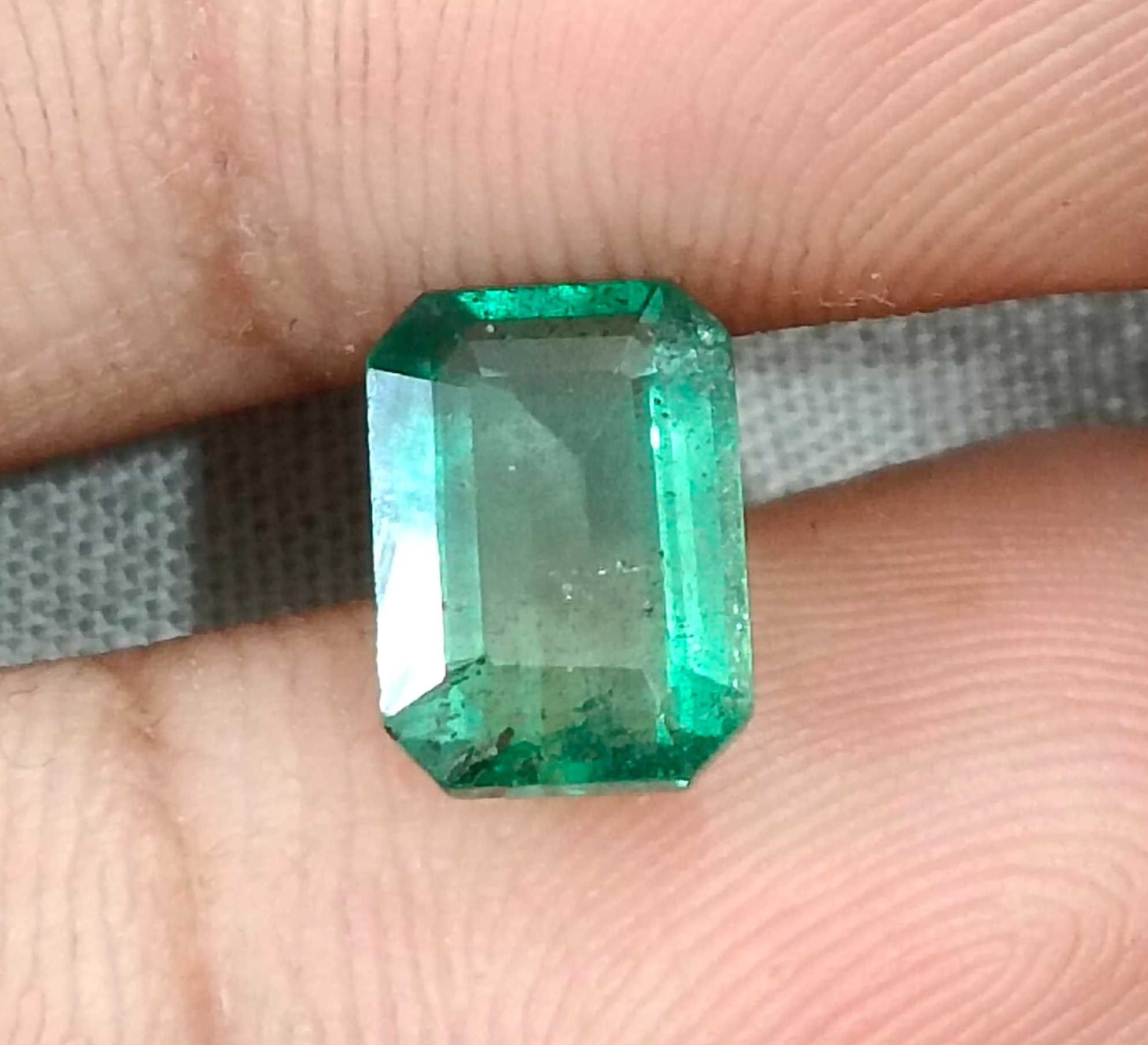2.32ct Medium light metallic green octagon cut Zambian emerald stone 
