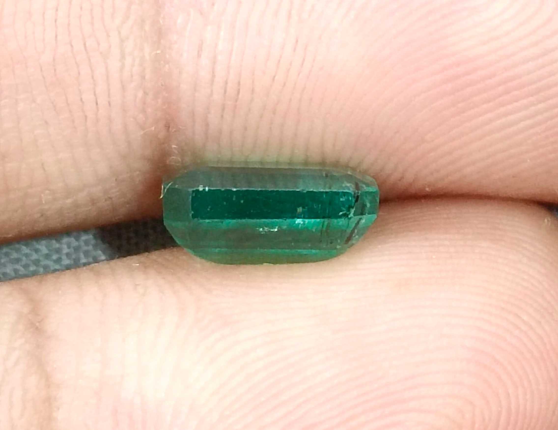 2.32ct Medium light metallic green octagon cut Zambian emerald stone 