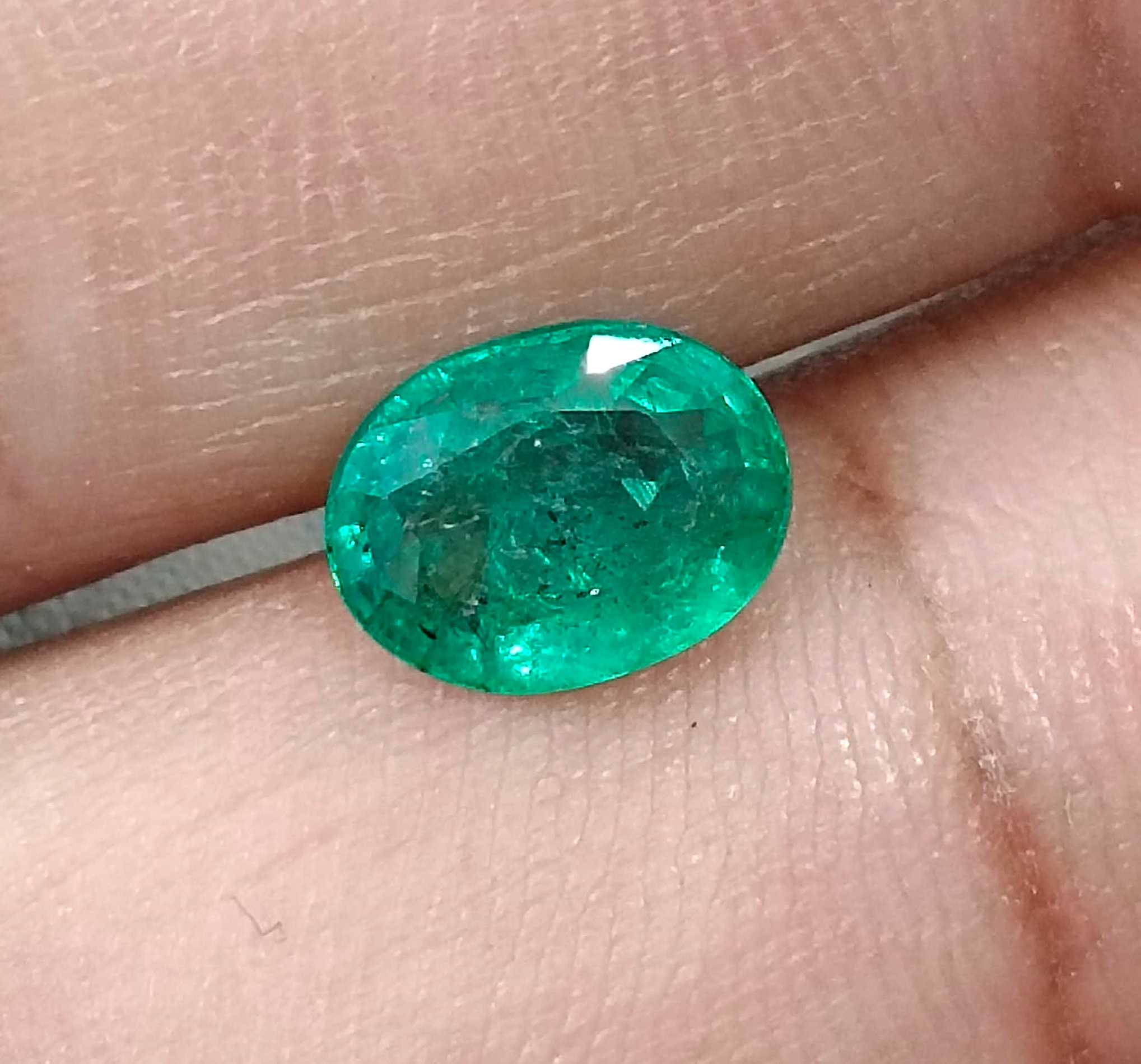 1.62ct Certified natural medium green oval cut Zambian emerald gemstone 