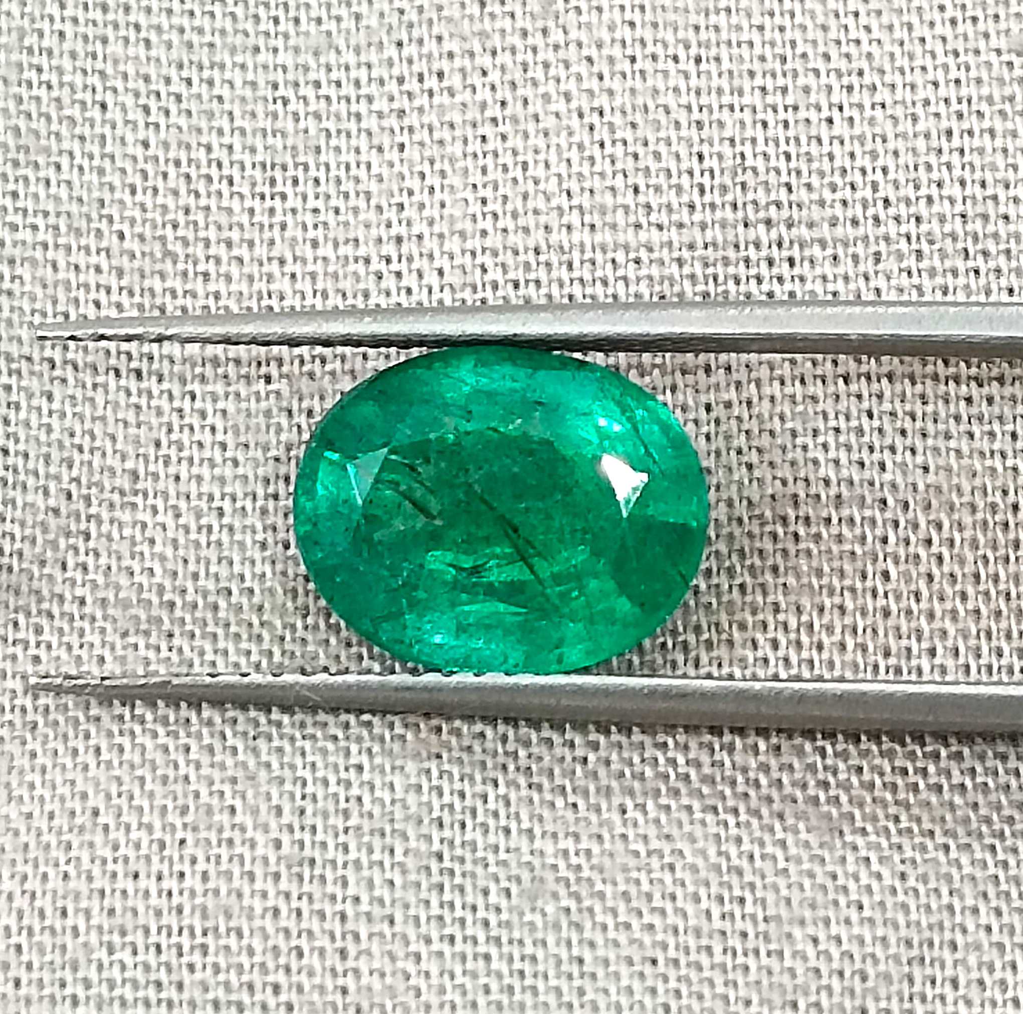 3.04ct GSI certified forest green oval cut Zambian emerald stone 