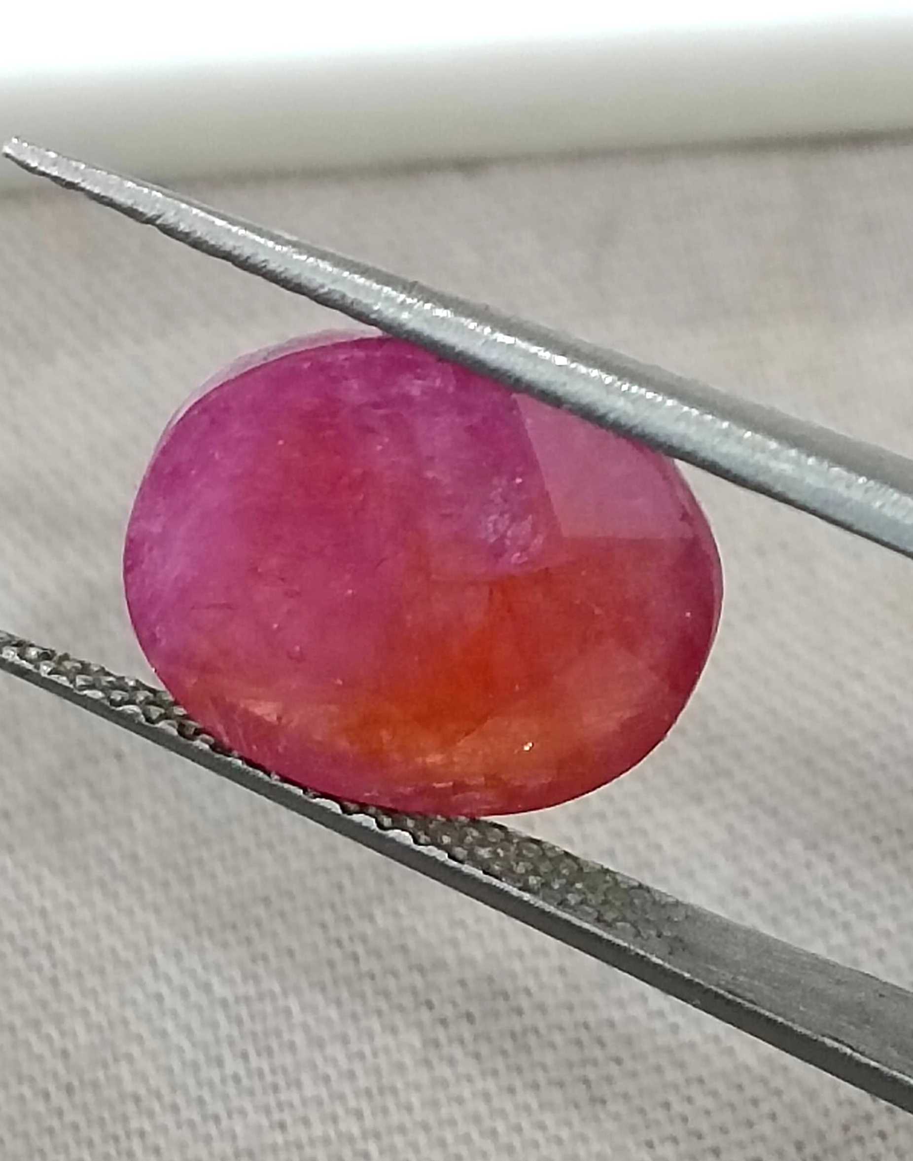 5.54ct GSI certified Mozambique ruby orangy red oval cut stone 