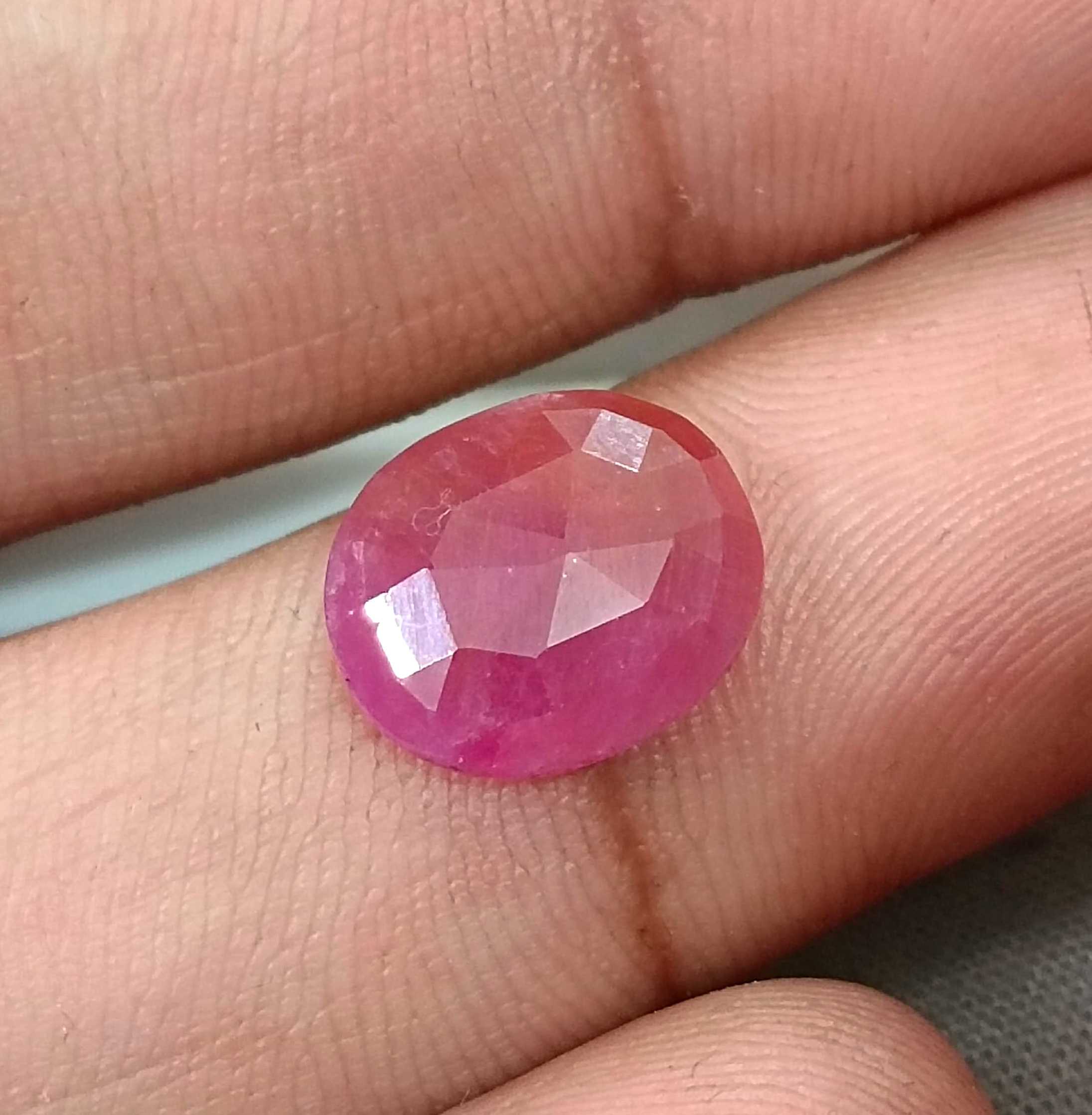 5.54ct GSI certified Mozambique ruby orangy red oval cut stone 