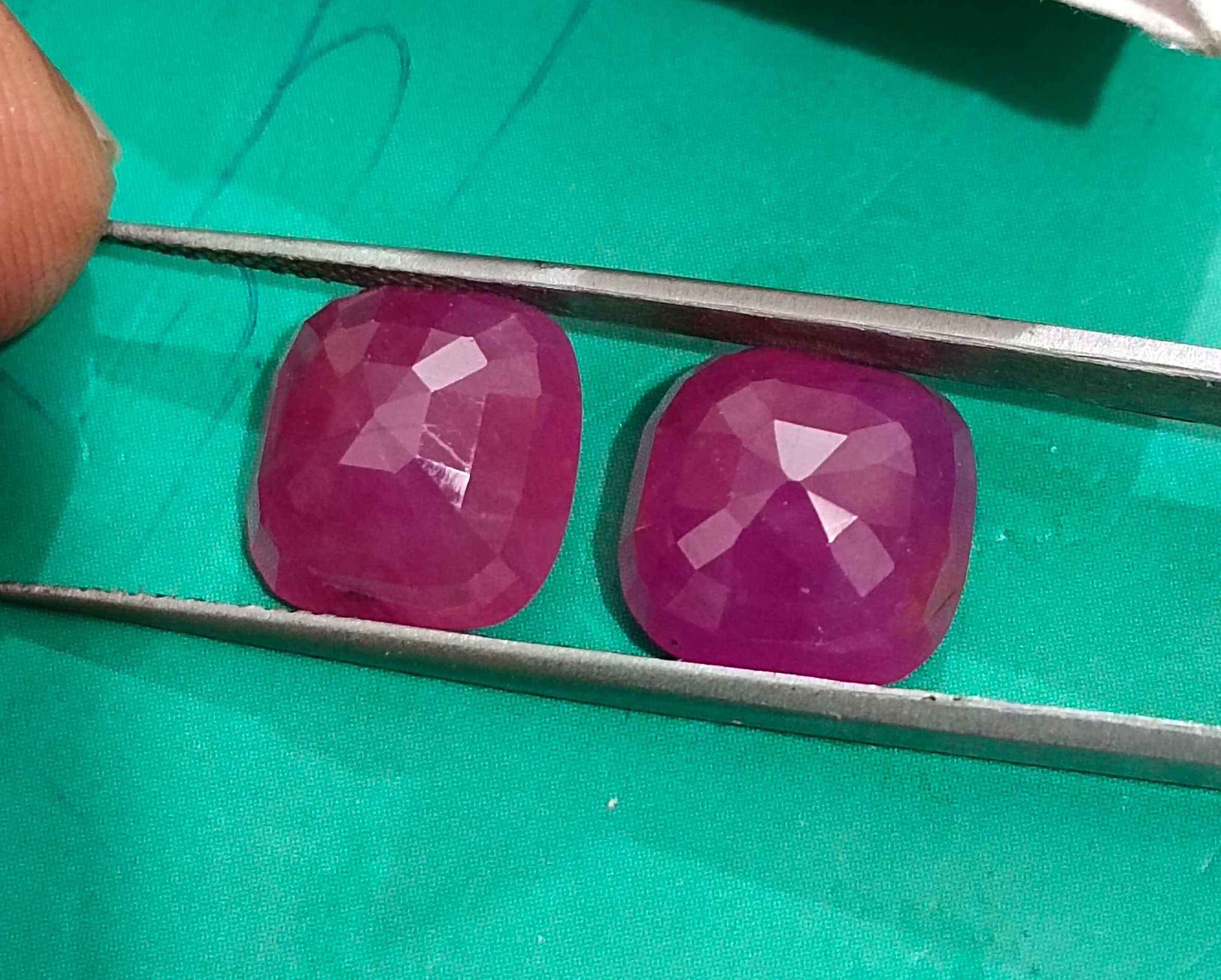 15.02ct Certified matching African ruby pair cushion cut purplish red stones