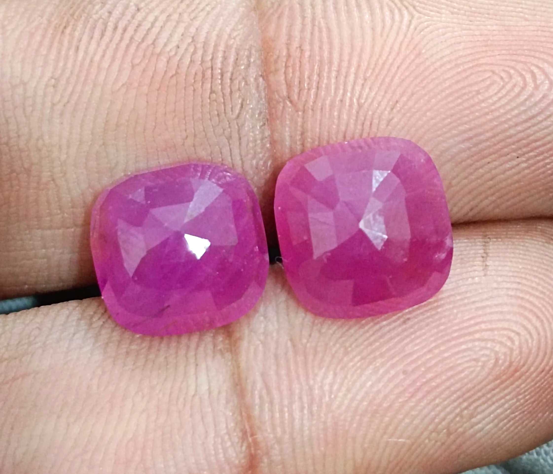 15.02ct Certified matching African ruby pair cushion cut purplish red stones