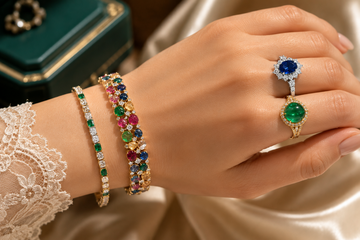 Natural diamond, emerald, ruby, blue pink sapphire, and pearl jewellery in gold.