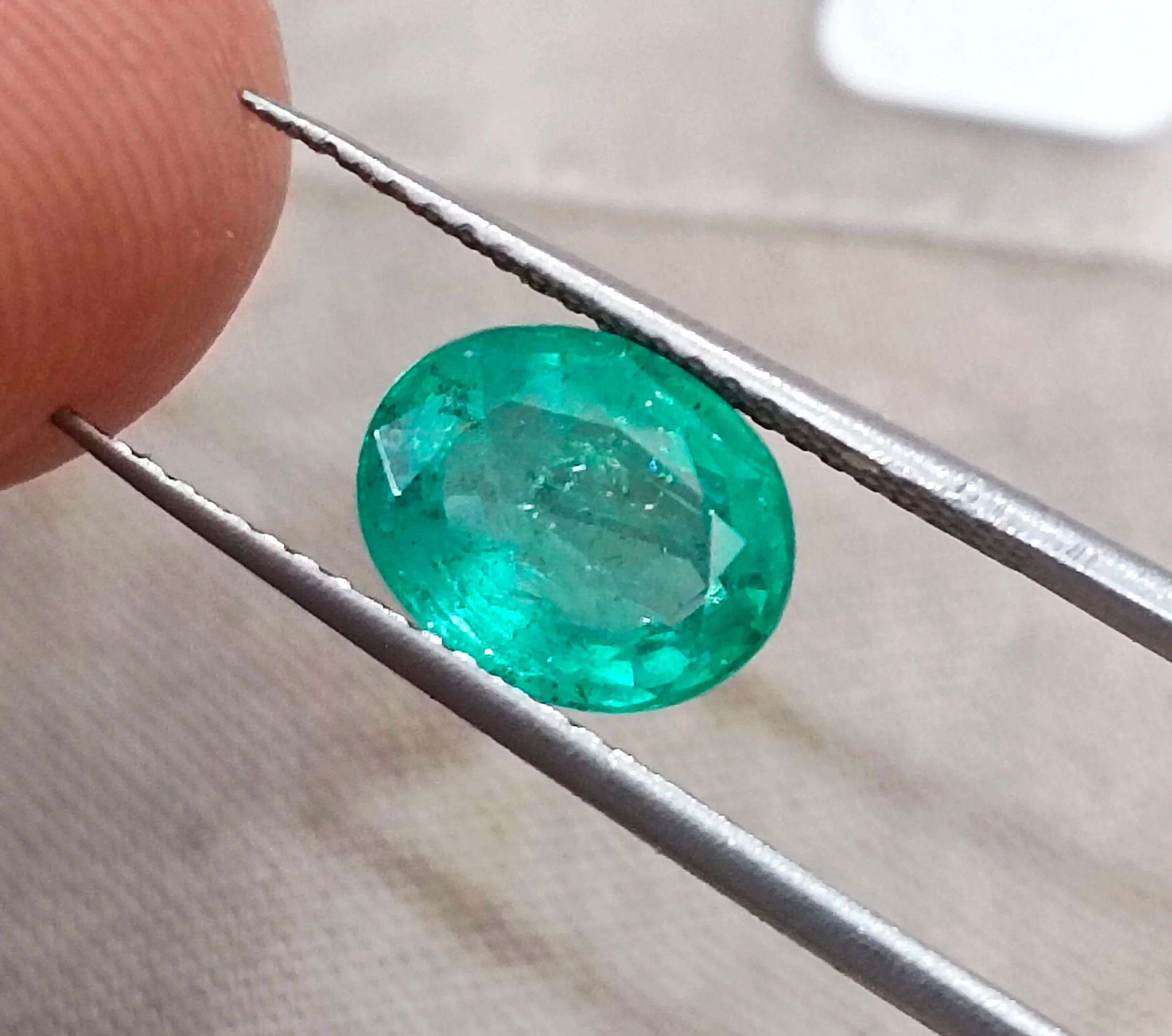 2.09ct Bright medium sea foam green Zambian emerald SGL certified