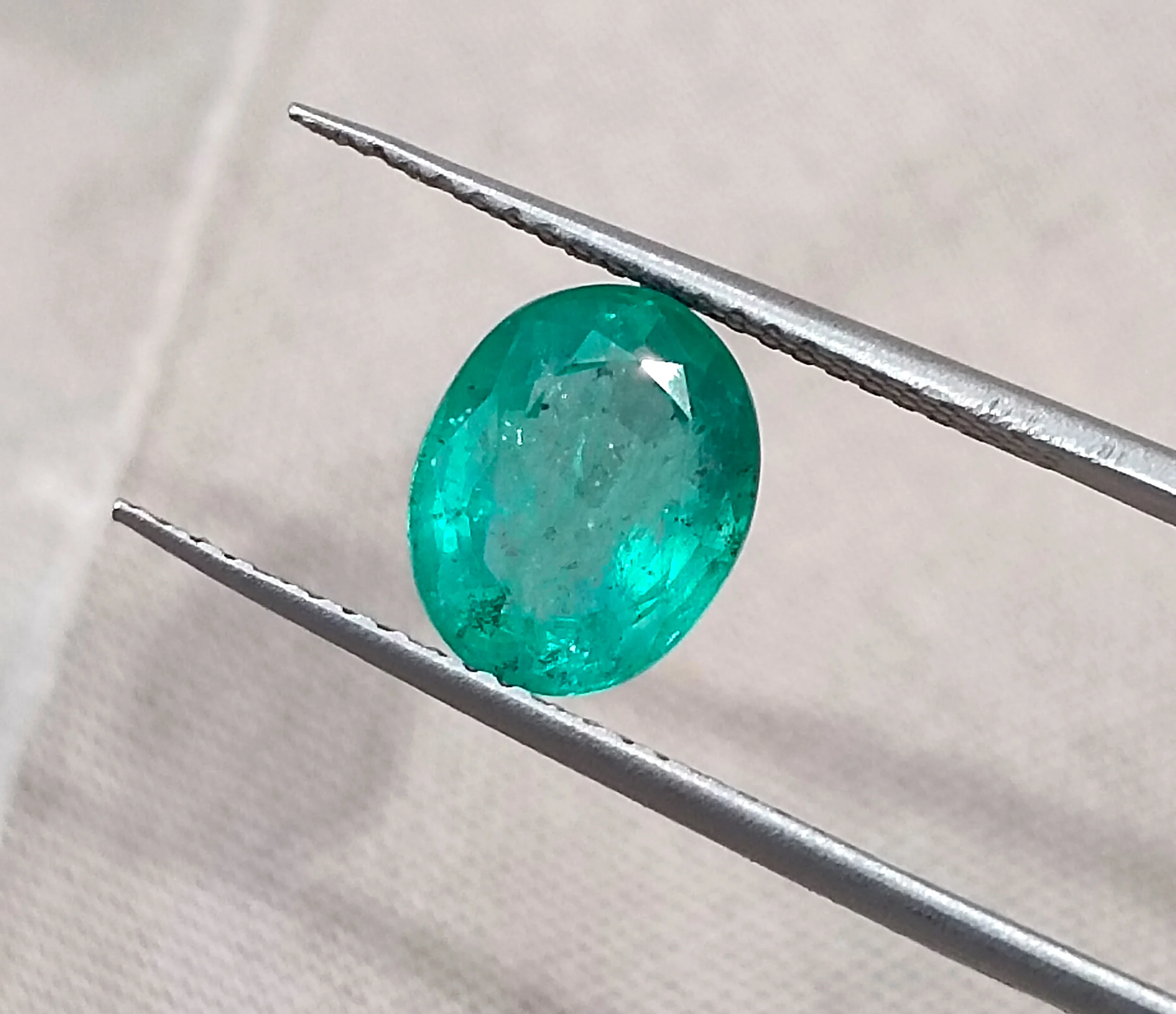 2.09ct Bright medium sea foam green Zambian emerald SGL certified