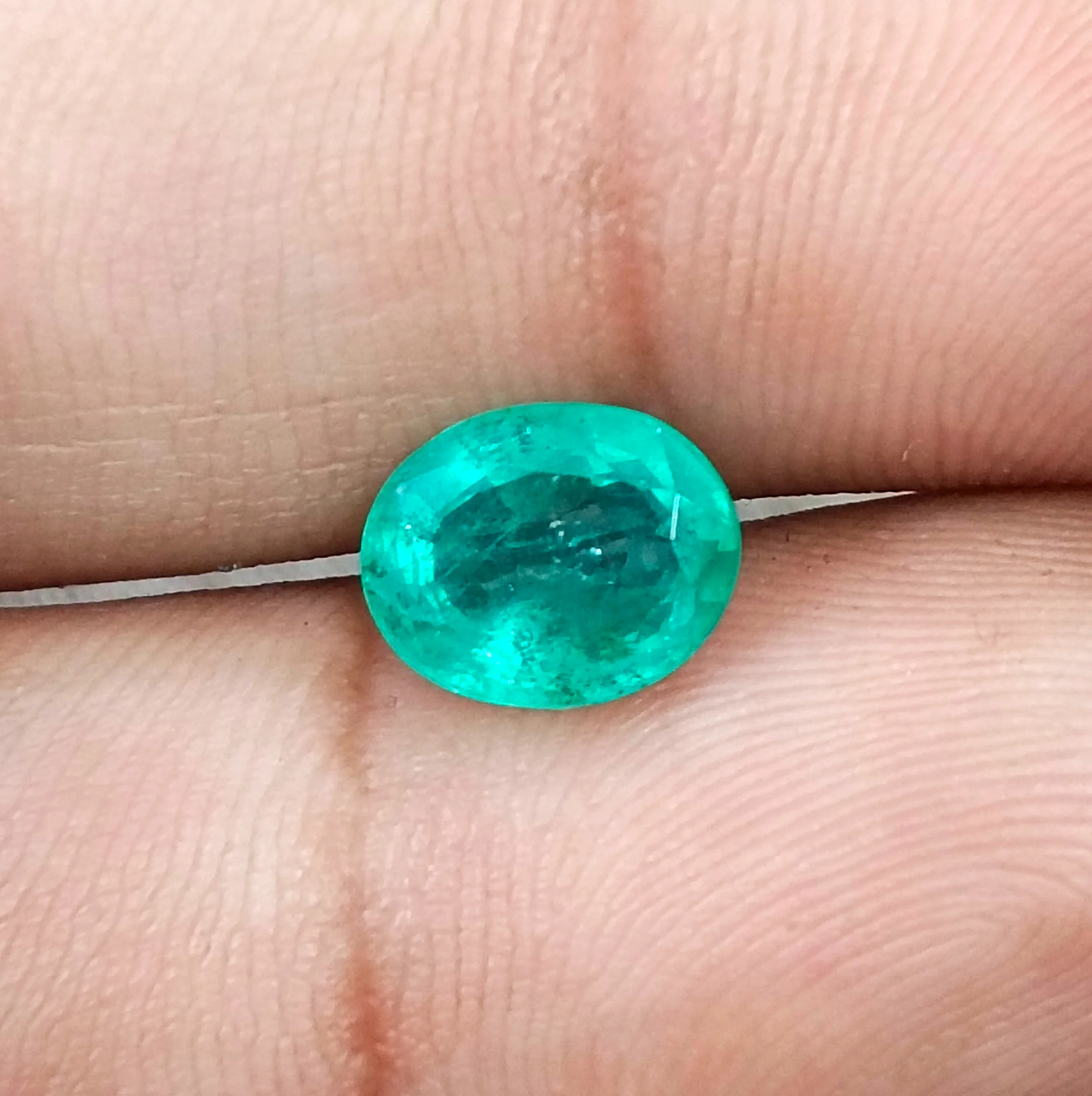 2.09ct Bright medium sea foam green Zambian emerald SGL certified