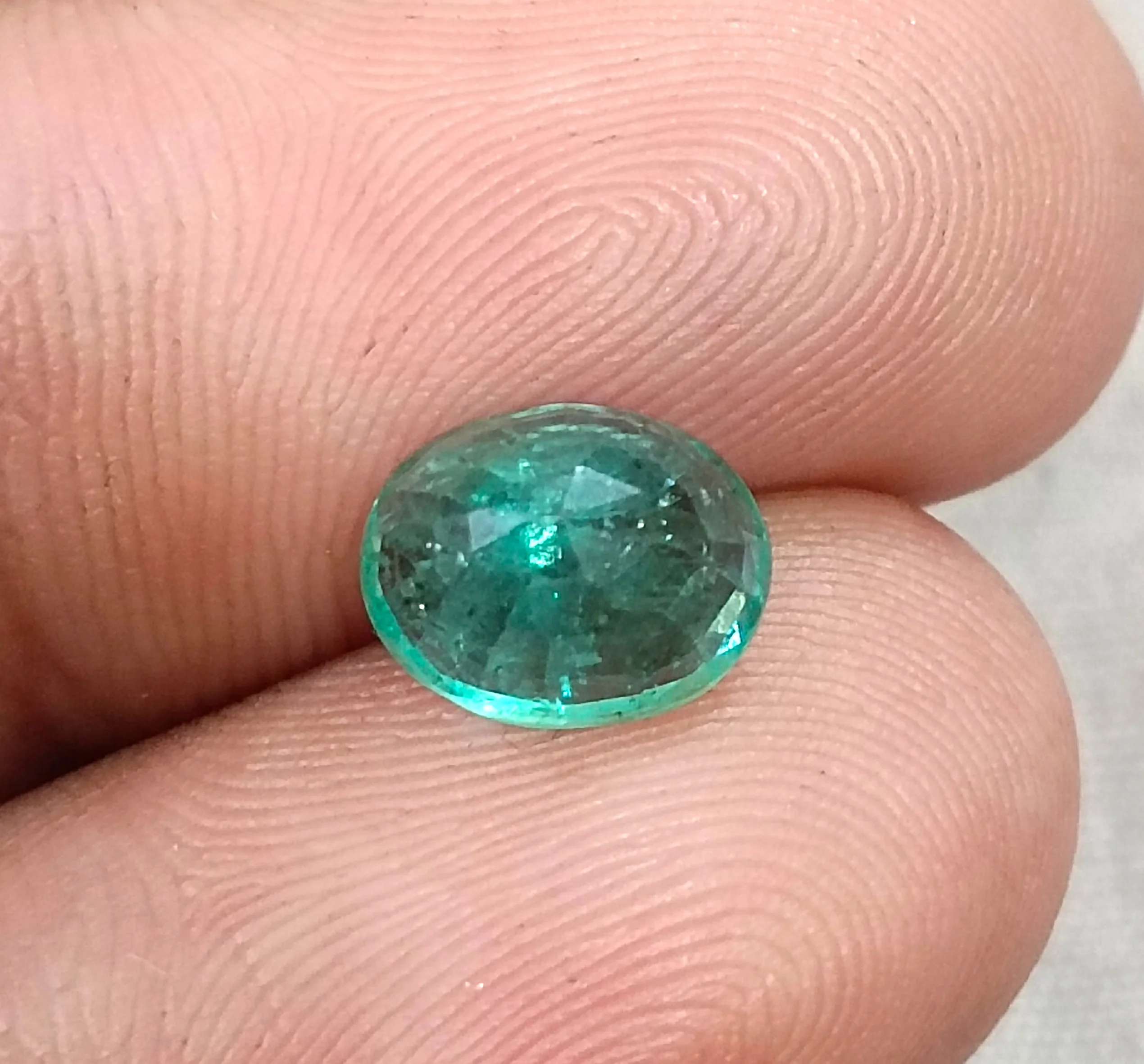 2.09ct Bright medium sea foam green Zambian emerald SGL certified