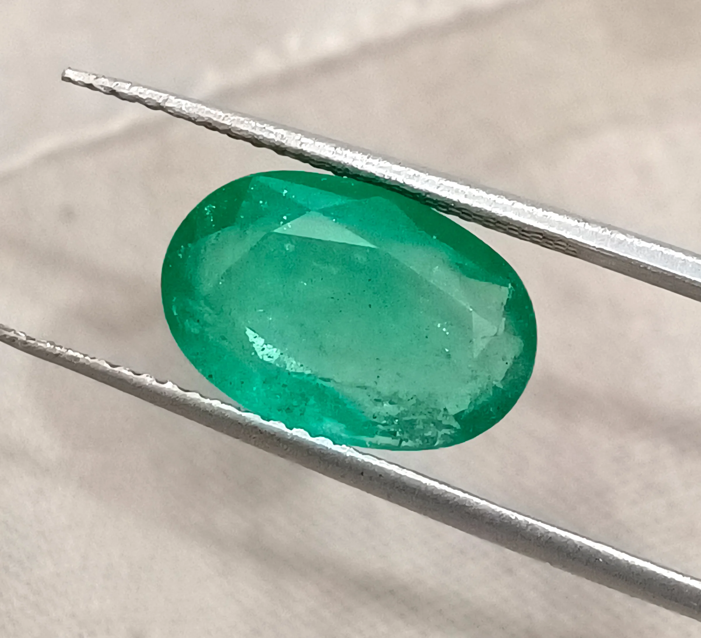 3.41ct Emerald medium spring green SGL certified oval gemstone/