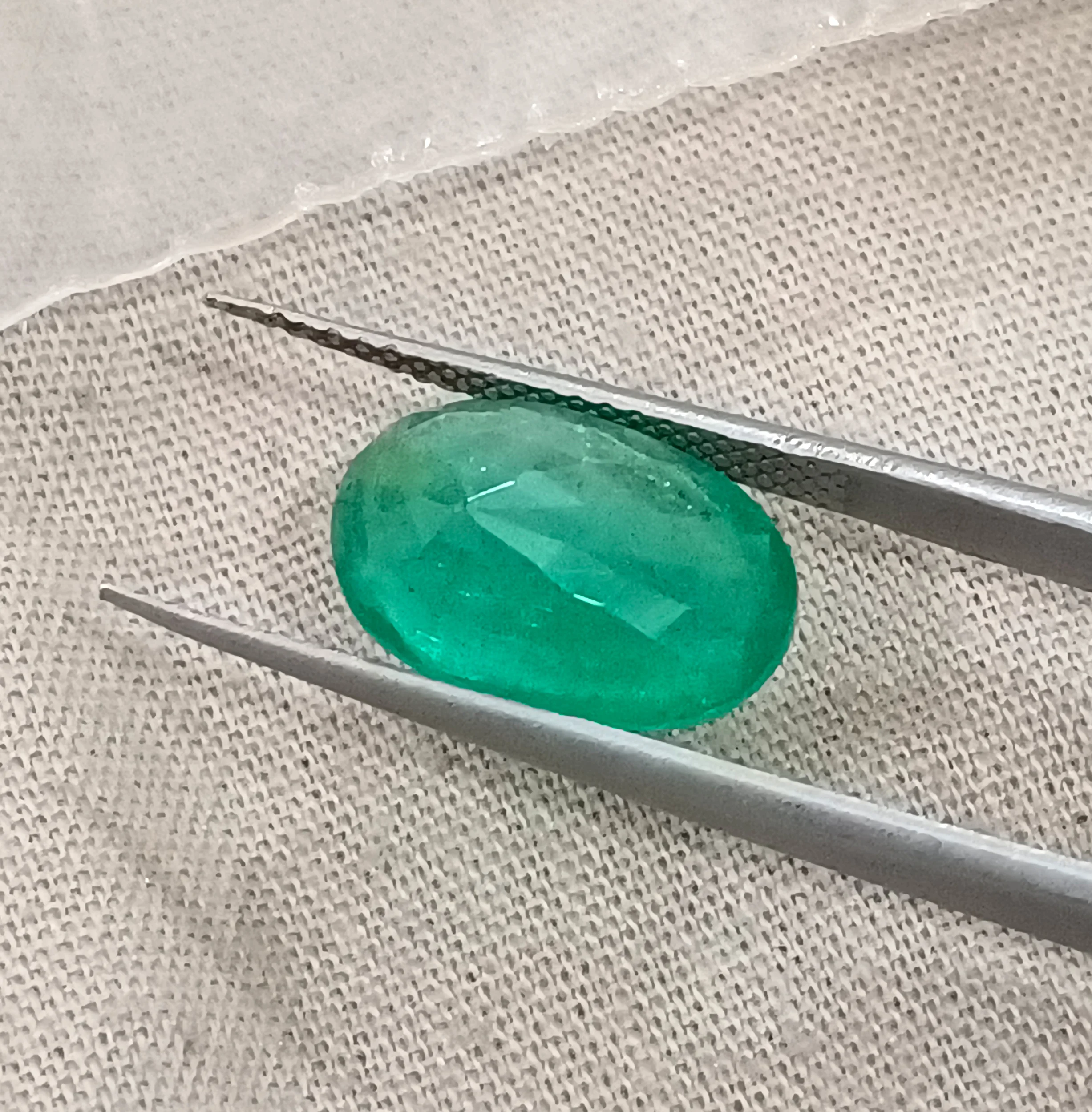 3.41ct Emerald medium spring green SGL certified oval gemstone