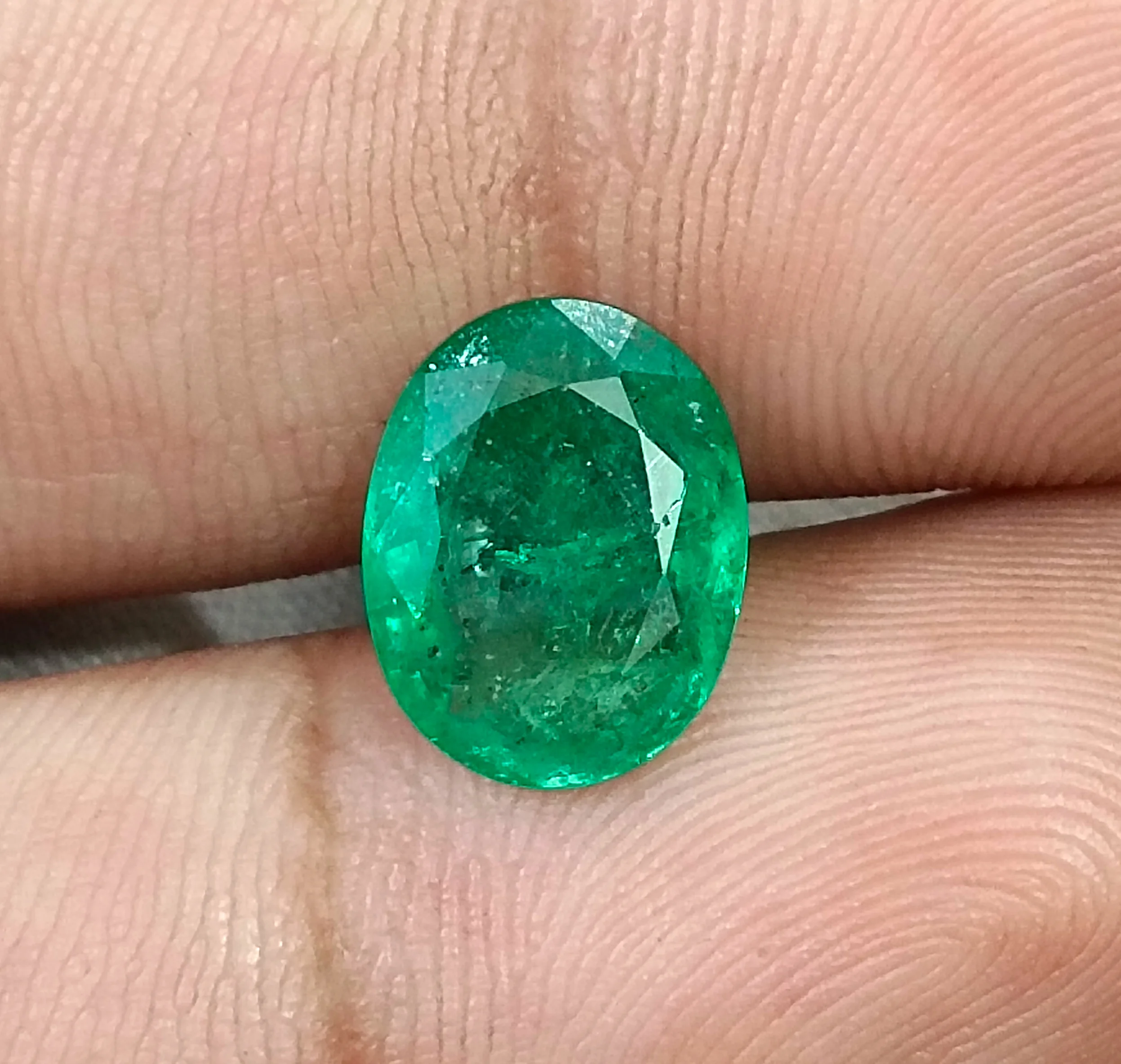 3.05ct Zambian emerald medium deep green SGL certified oval gemstone
