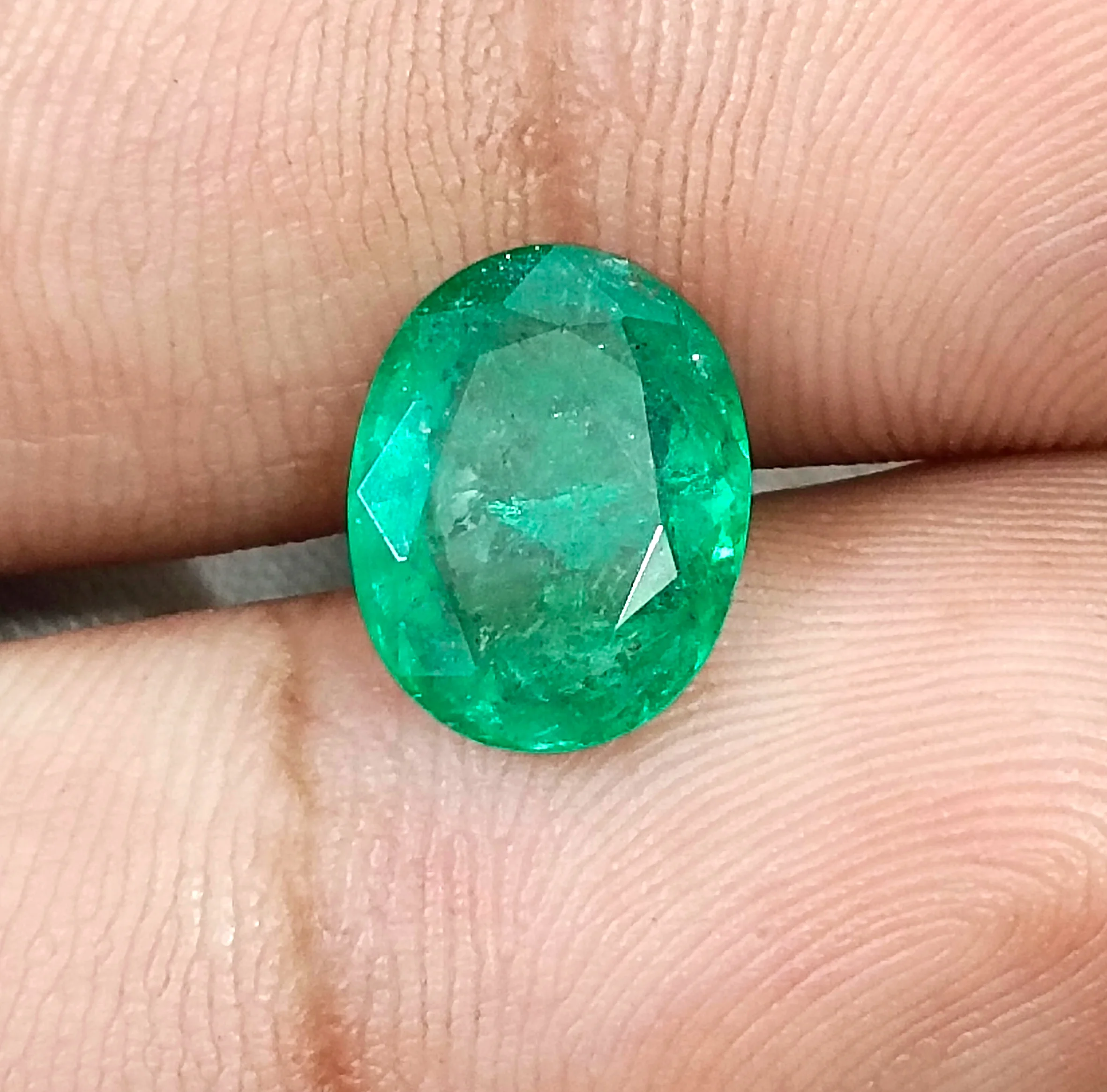 3.05ct Zambian emerald medium deep green SGL certified oval gemstone