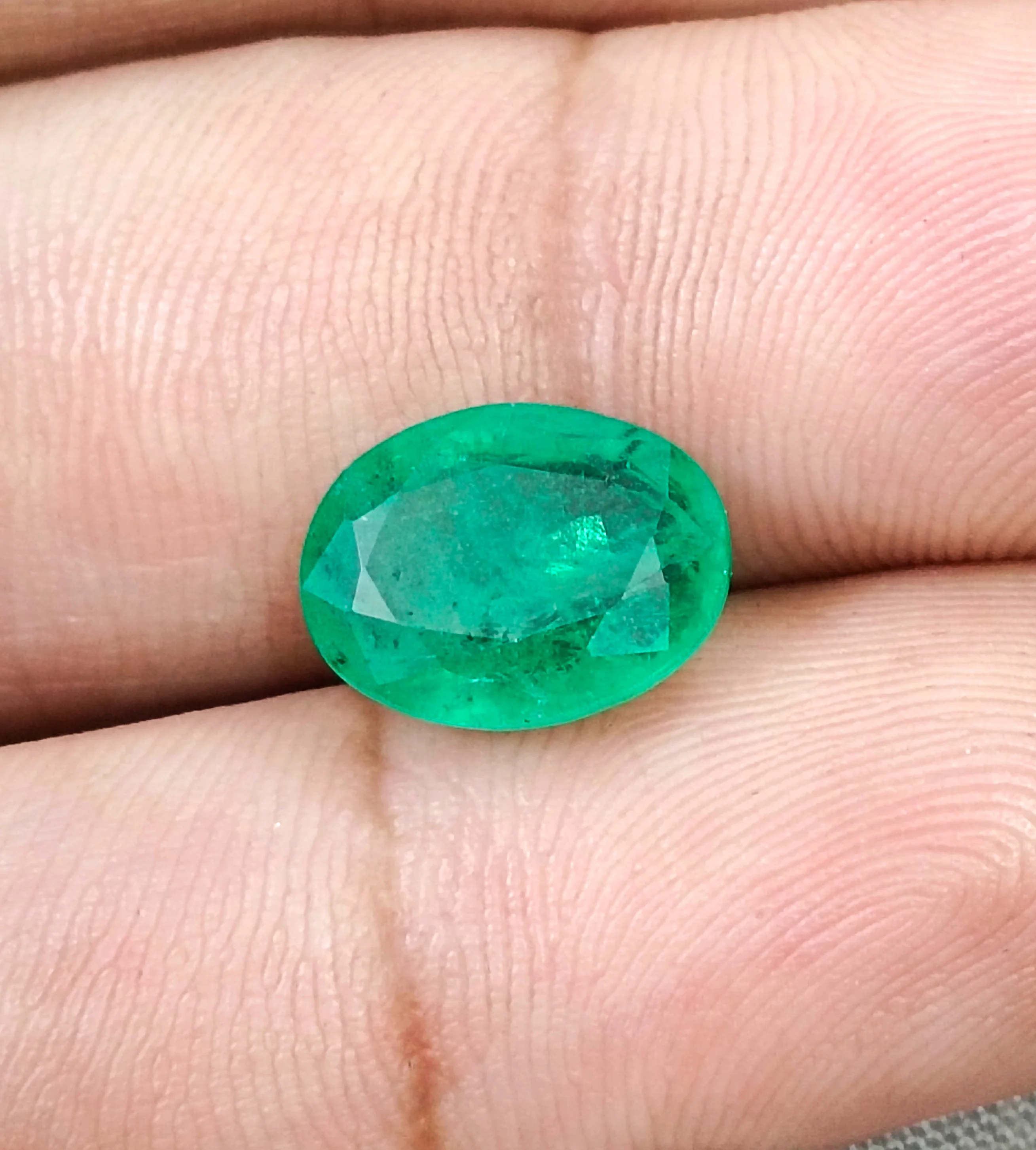 4.33ct Natural emerald medium spring green SGL certified oval gemstone