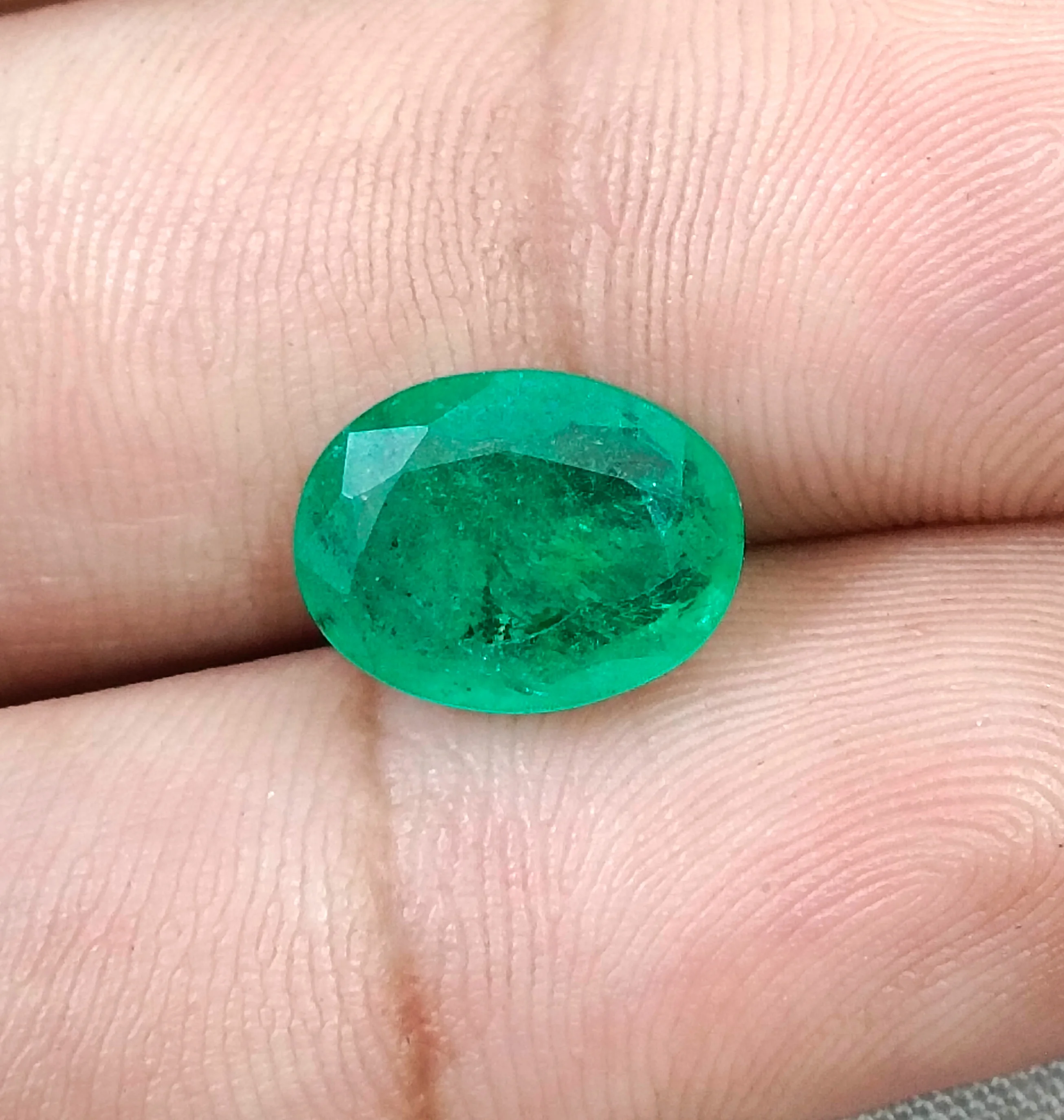 4.33ct Natural emerald medium spring green SGL certified oval gemstone