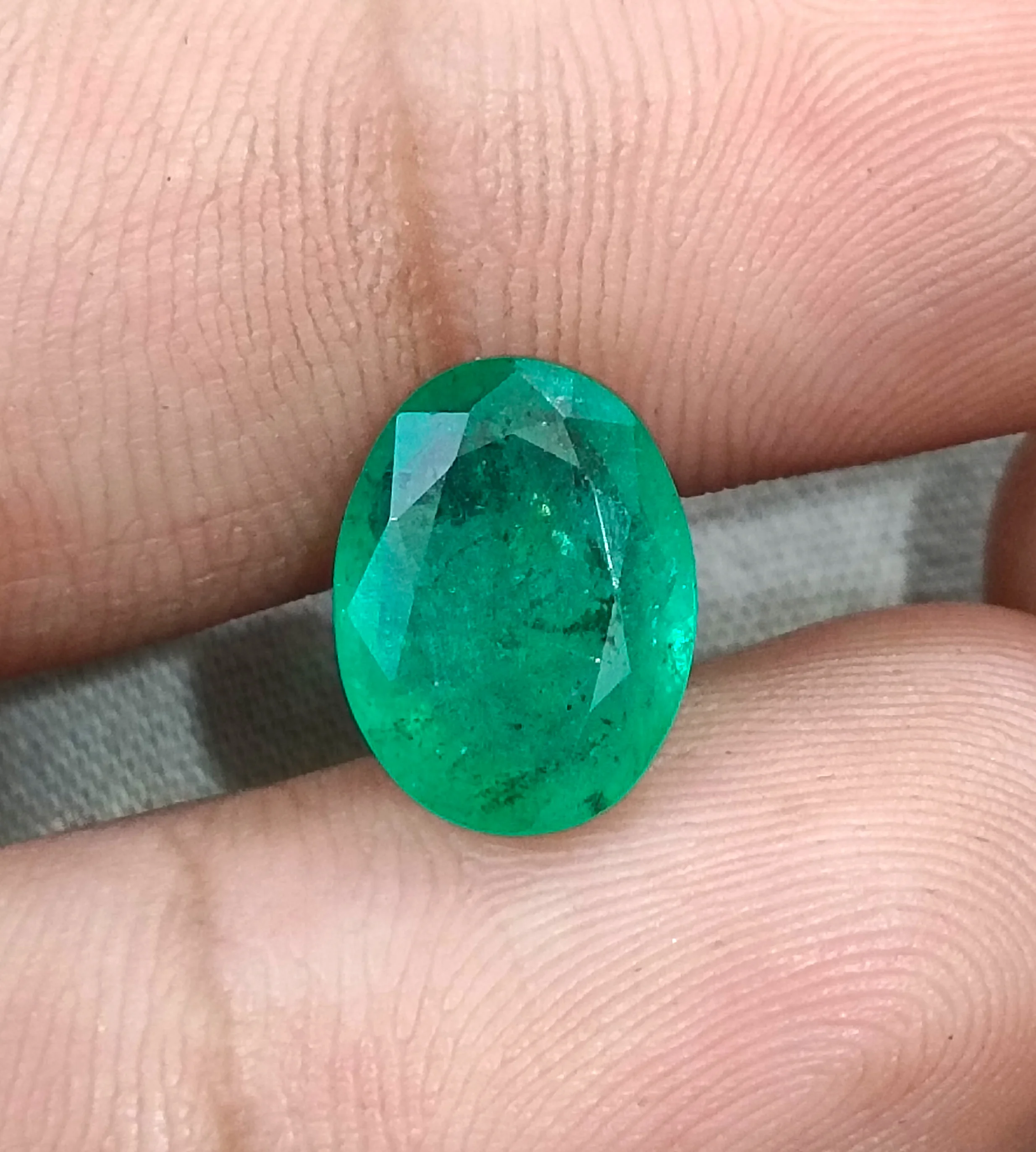4.33ct Natural emerald medium spring green SGL certified oval gemstone