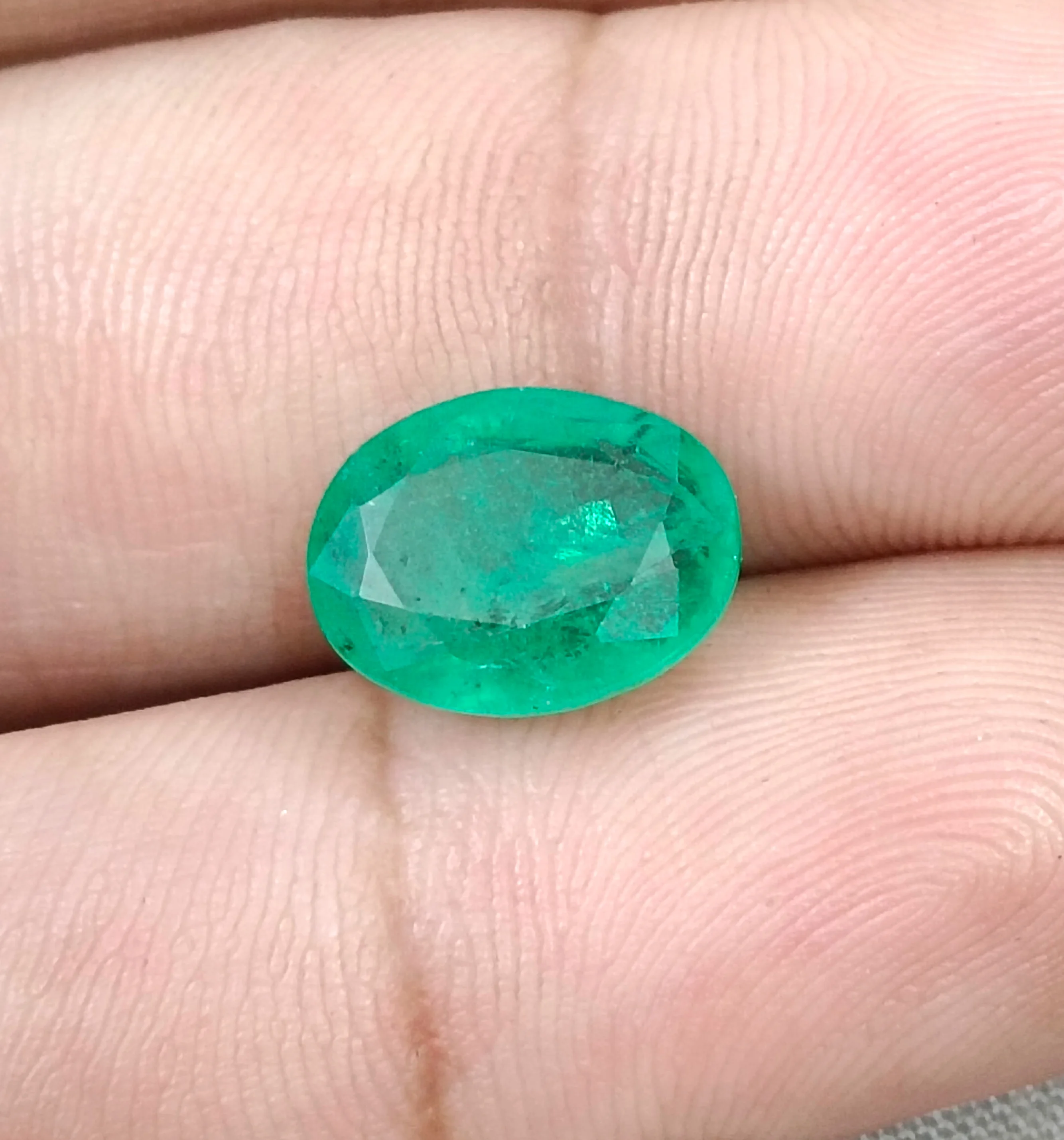 4.33ct Natural emerald medium spring green SGL certified oval gemstone