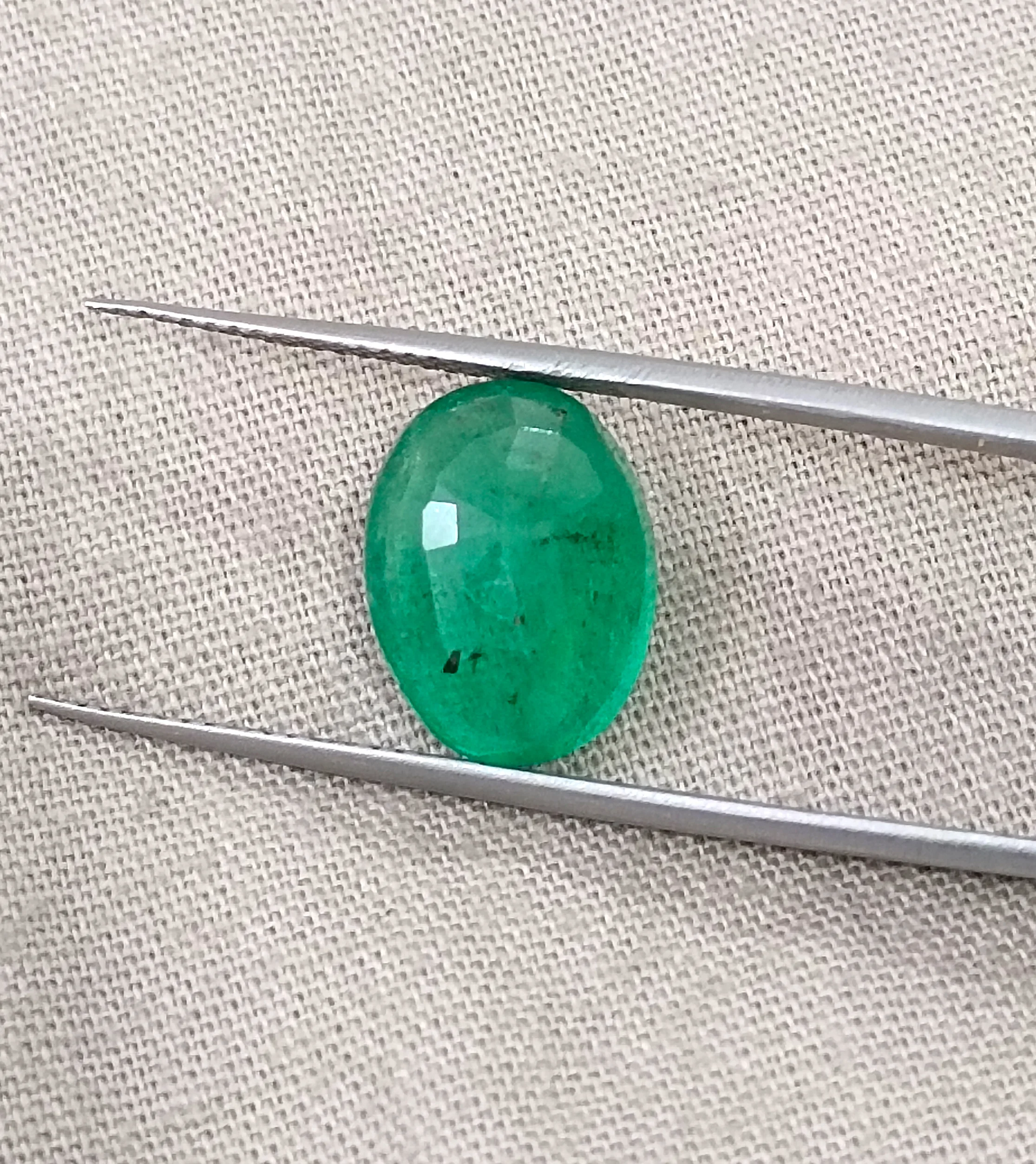 4.33ct Natural emerald medium spring green SGL certified oval gemstone