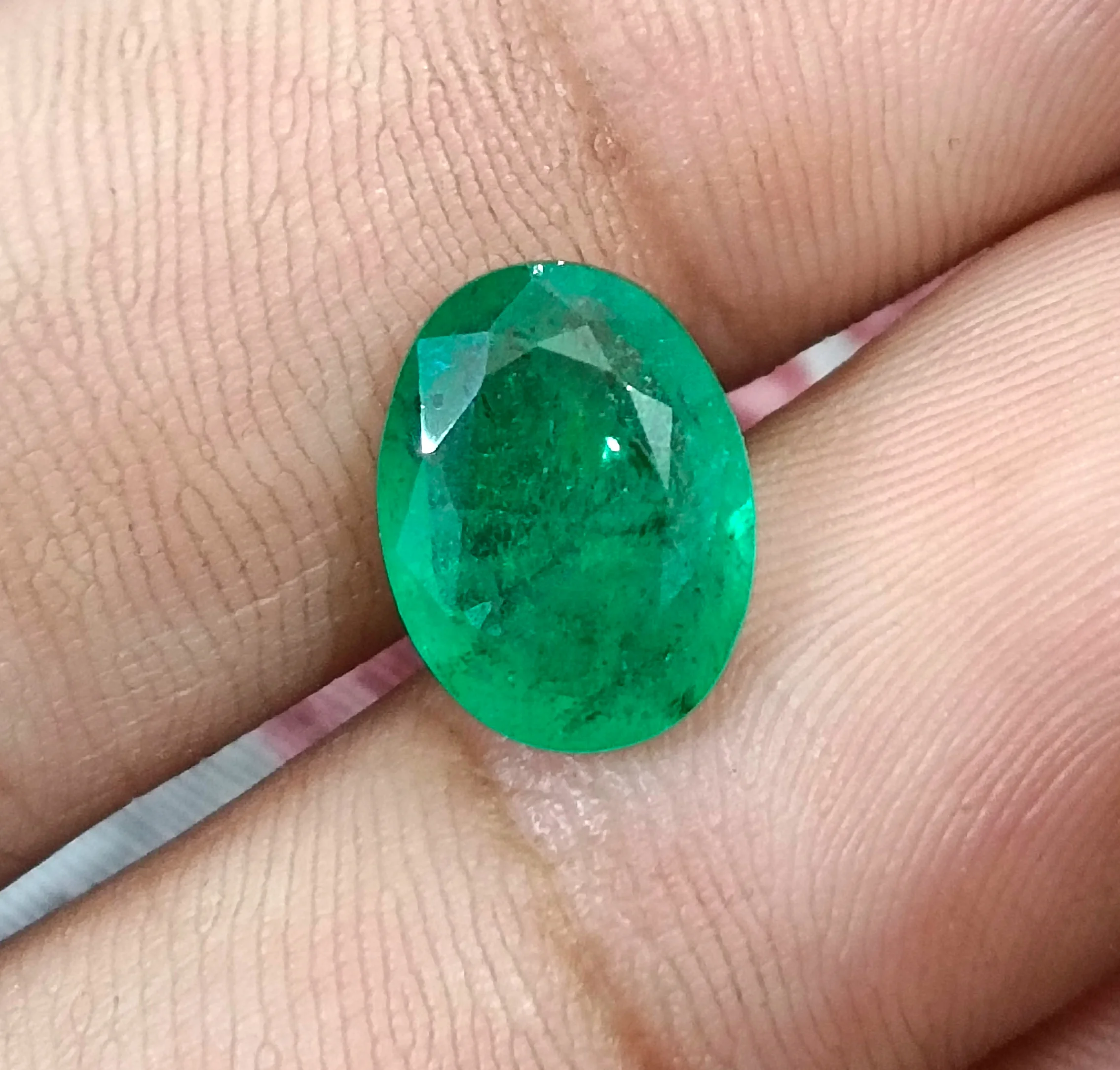 4.33ct Natural emerald medium spring green SGL certified oval gemstone