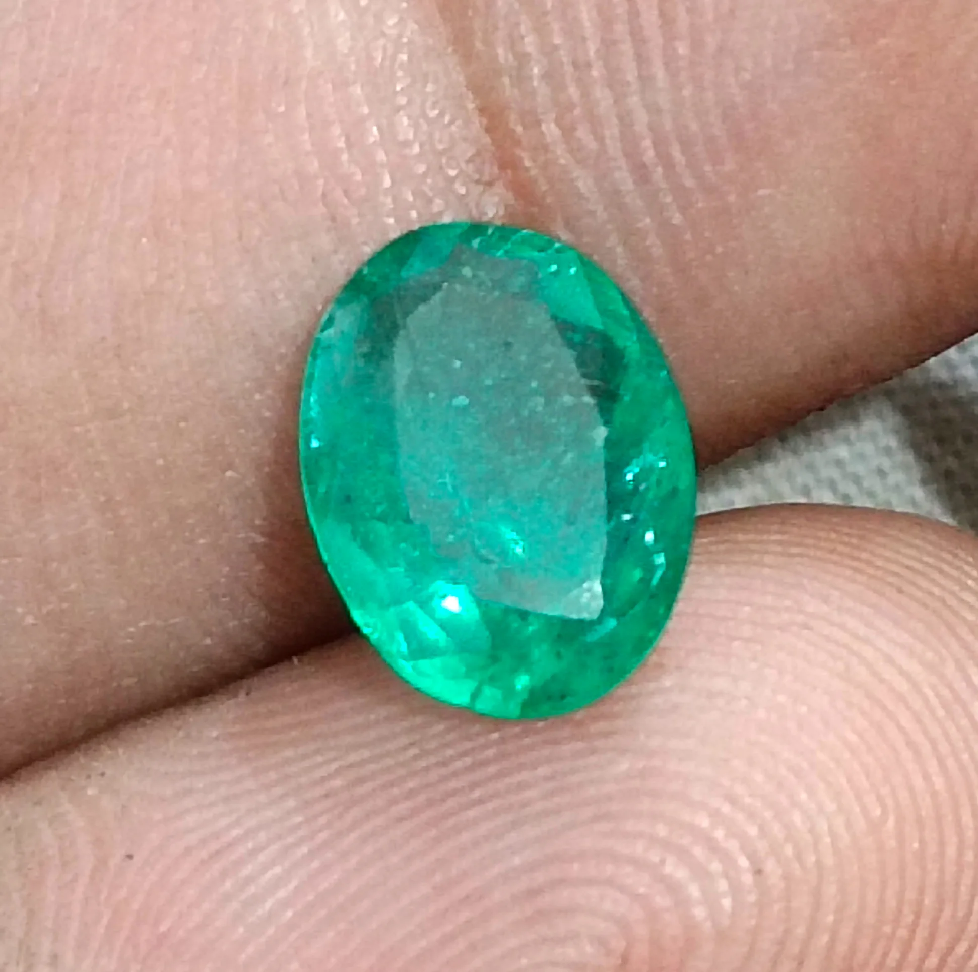 1.74ct Emerald deep green SGL certified oval Zambian gemstone