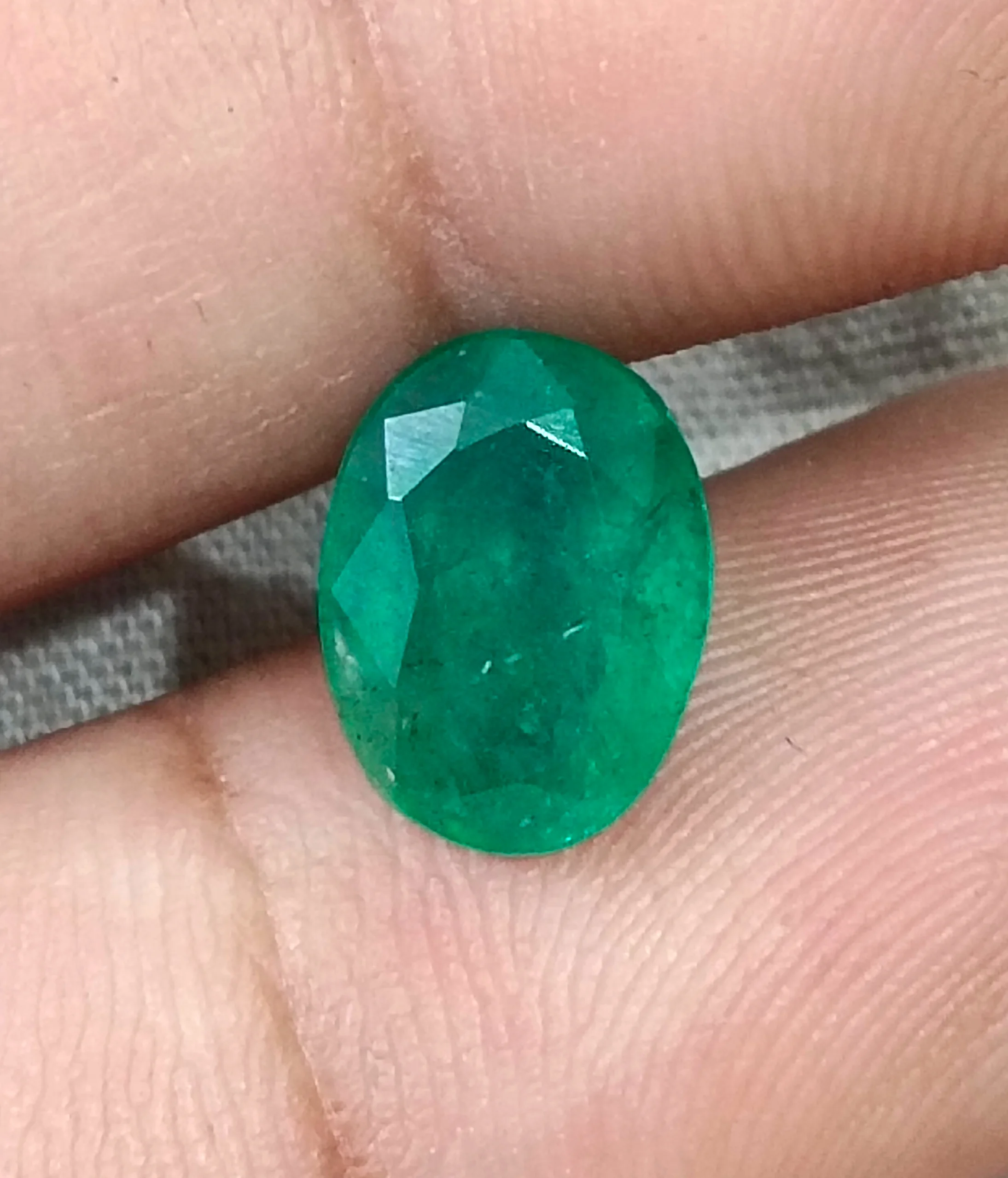 2.73ct Natural emerald deep velvet green oval SGL certified stone