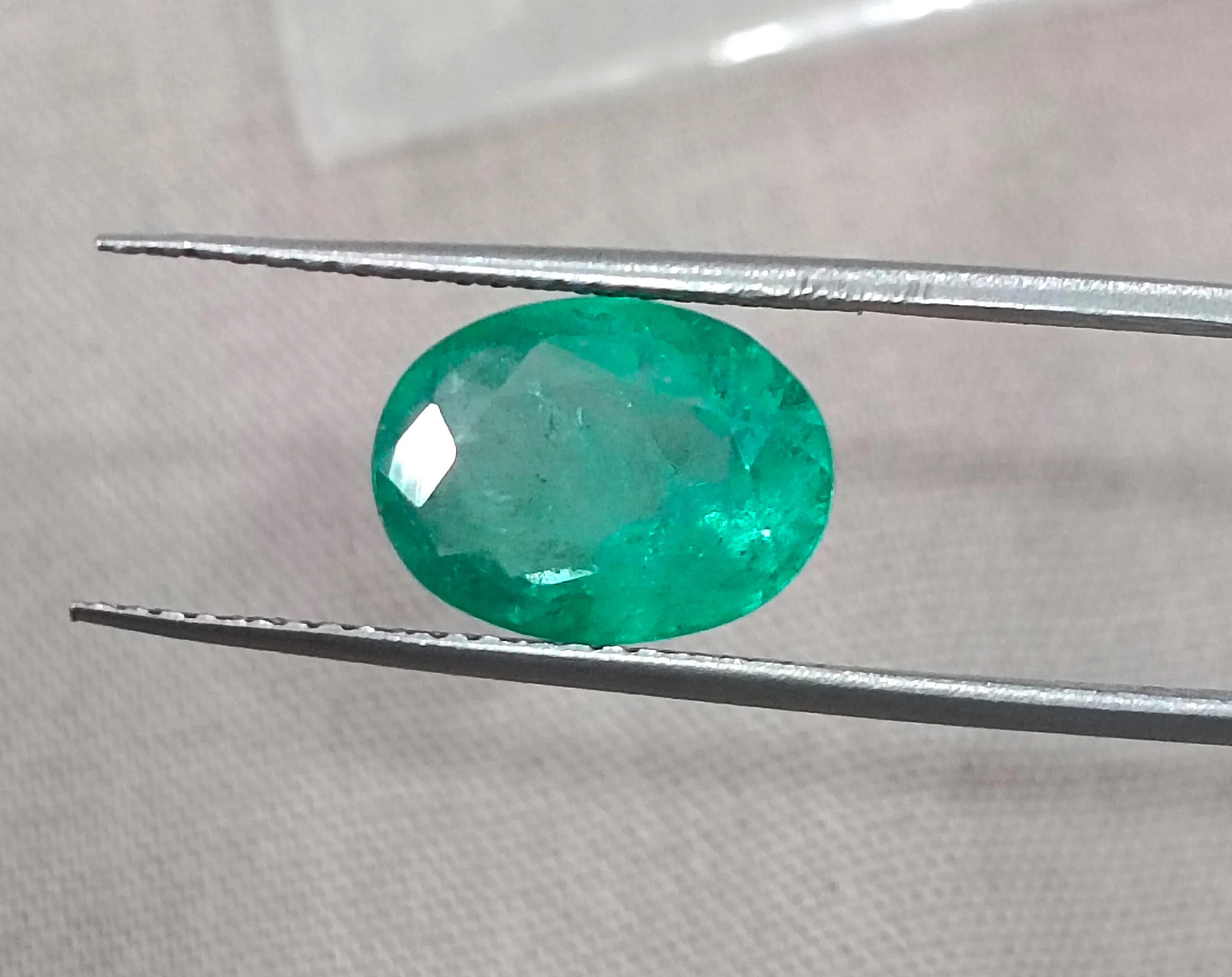 3.13ct Natural emerald bright sea green oval SGL certified gemstone