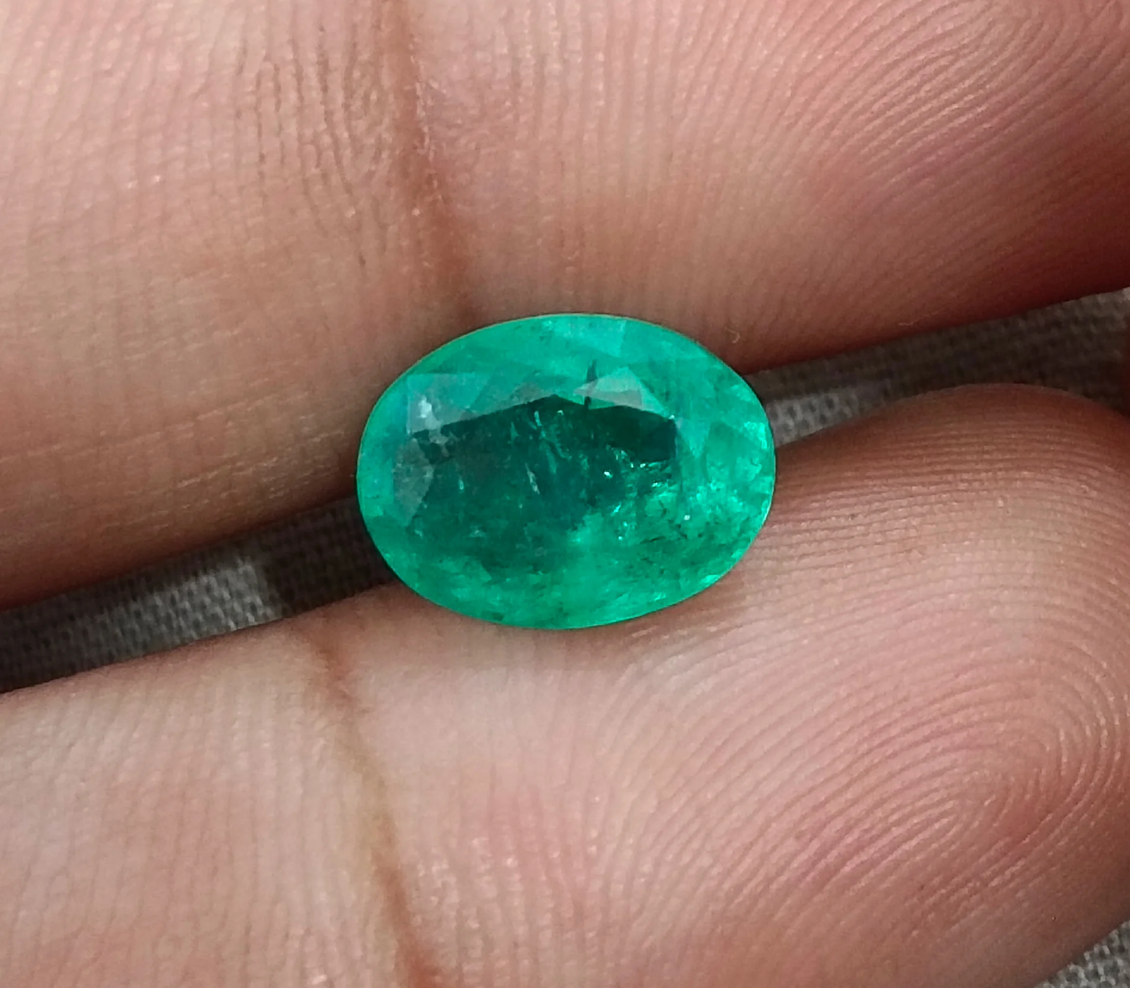 3.13ct Natural emerald bright sea green oval SGL certified gemstone