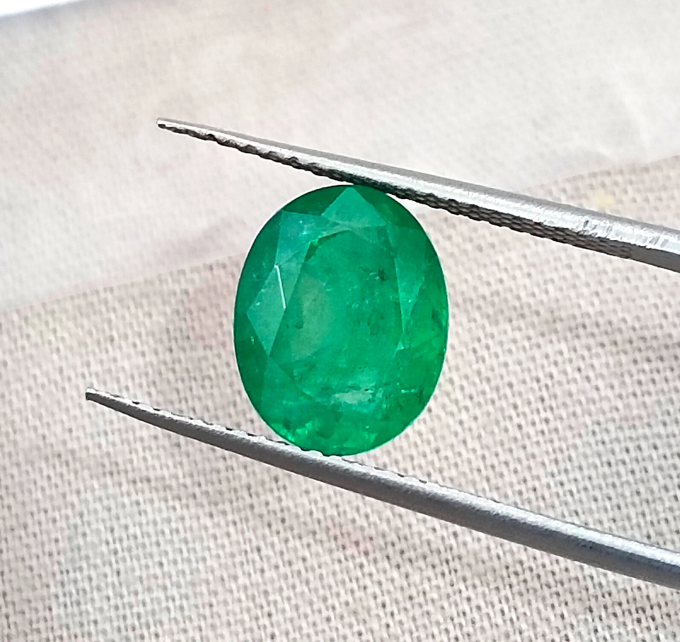 2.83ct Emerald SGL certified medium deep pure green oval cut stone