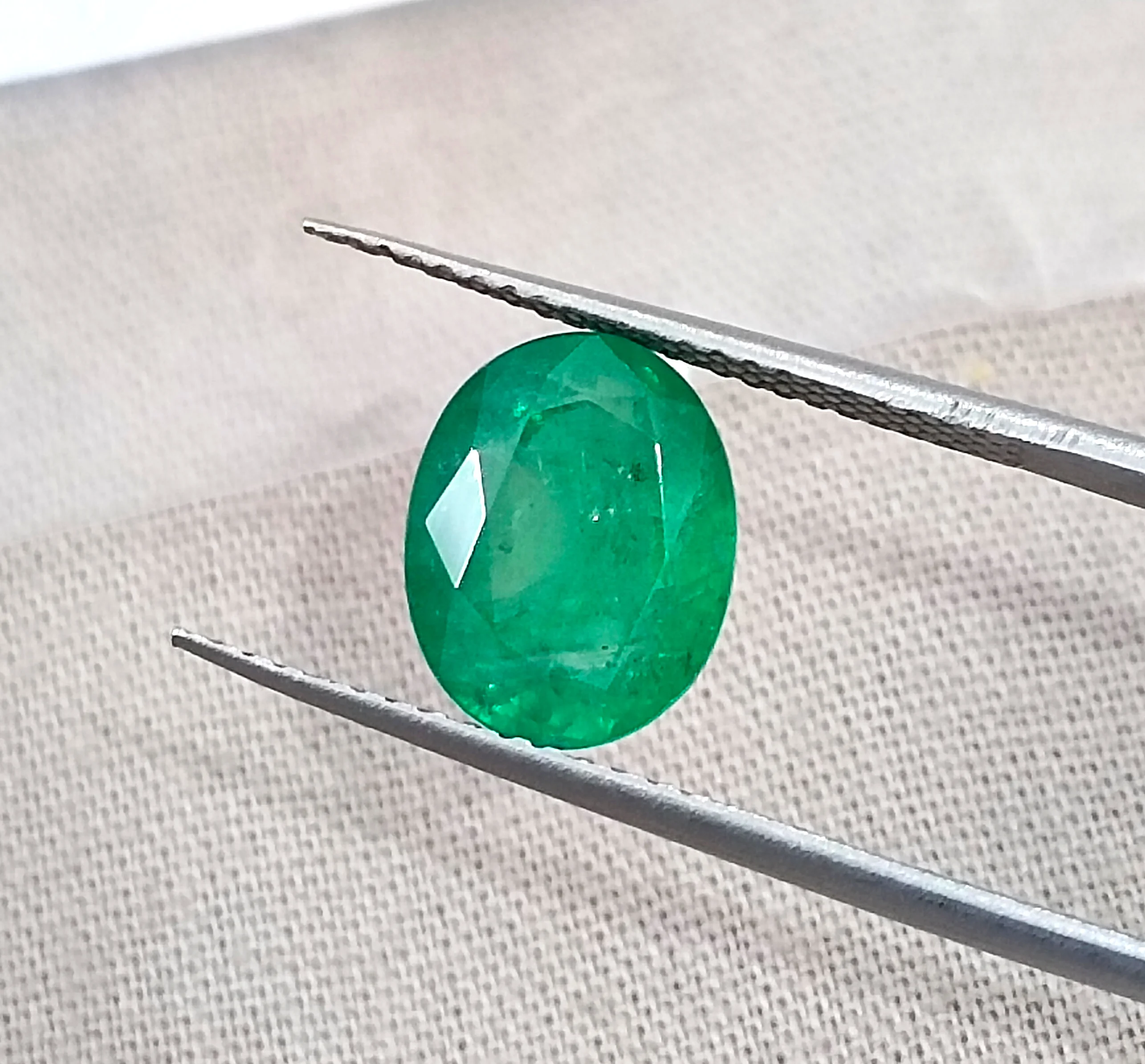 2.83ct Emerald SGL certified medium deep pure green oval cut stone