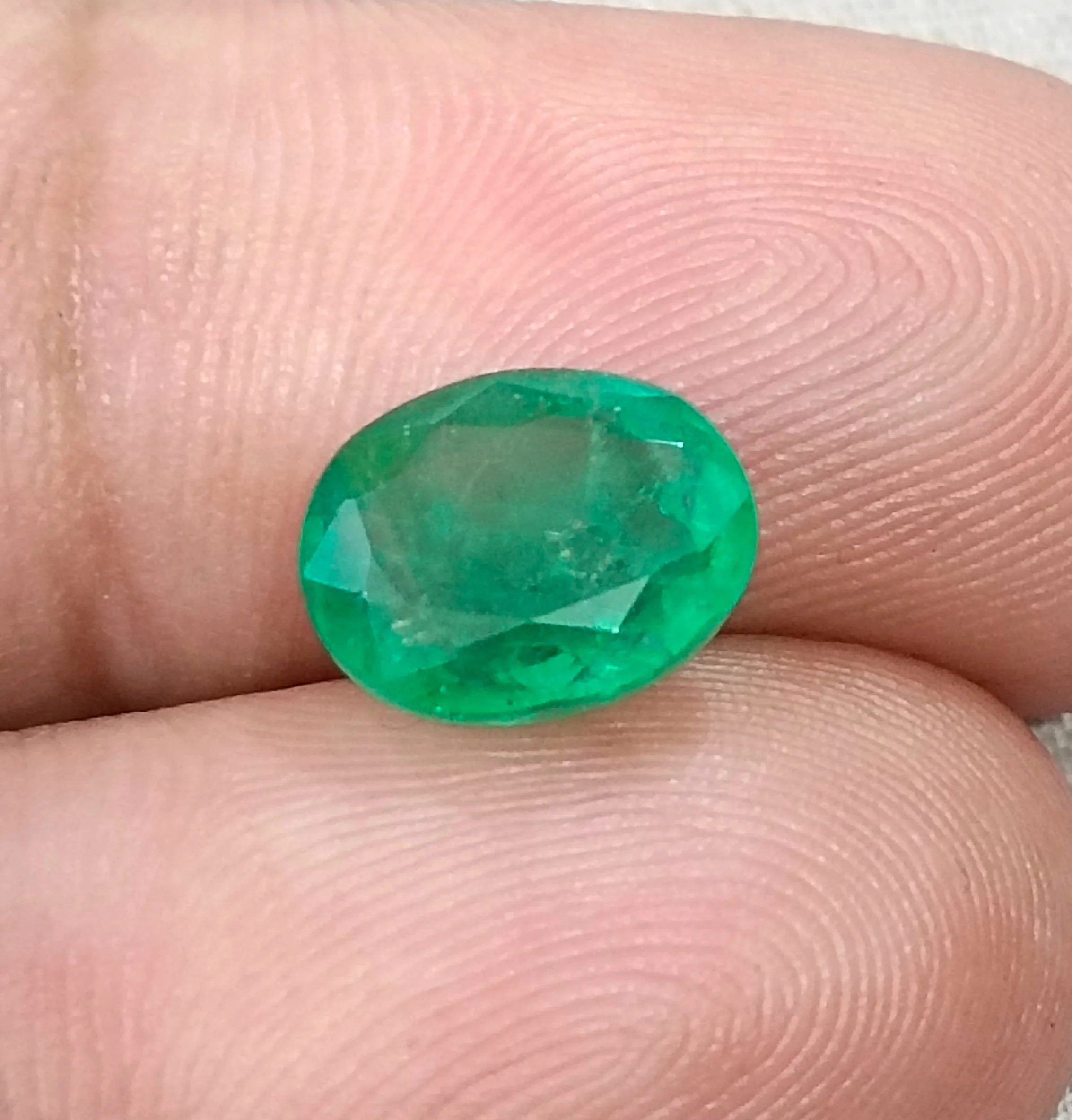 2.83ct Emerald SGL certified medium deep pure green oval cut stone