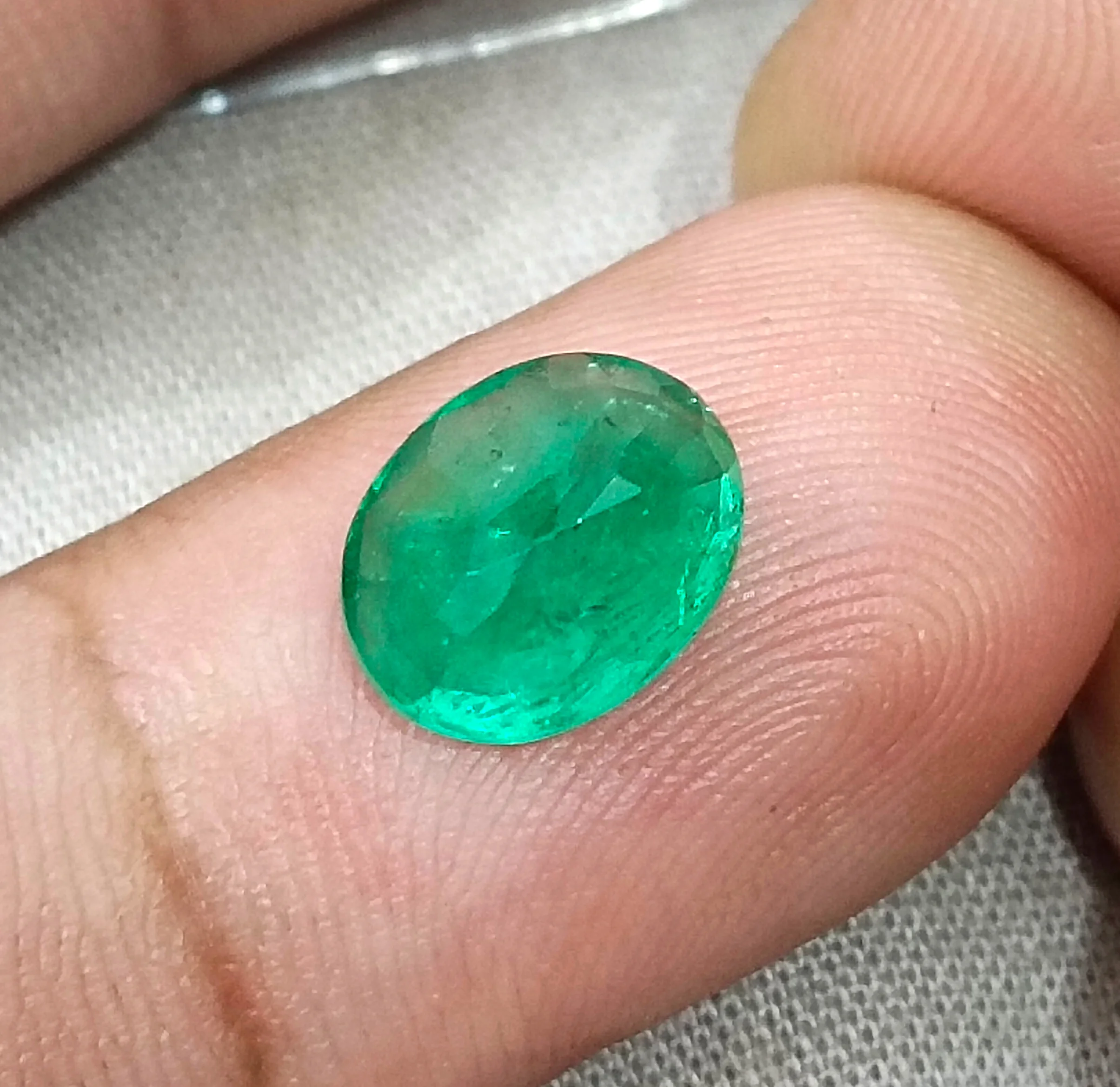 2.83ct Emerald SGL certified medium deep pure green oval cut stone