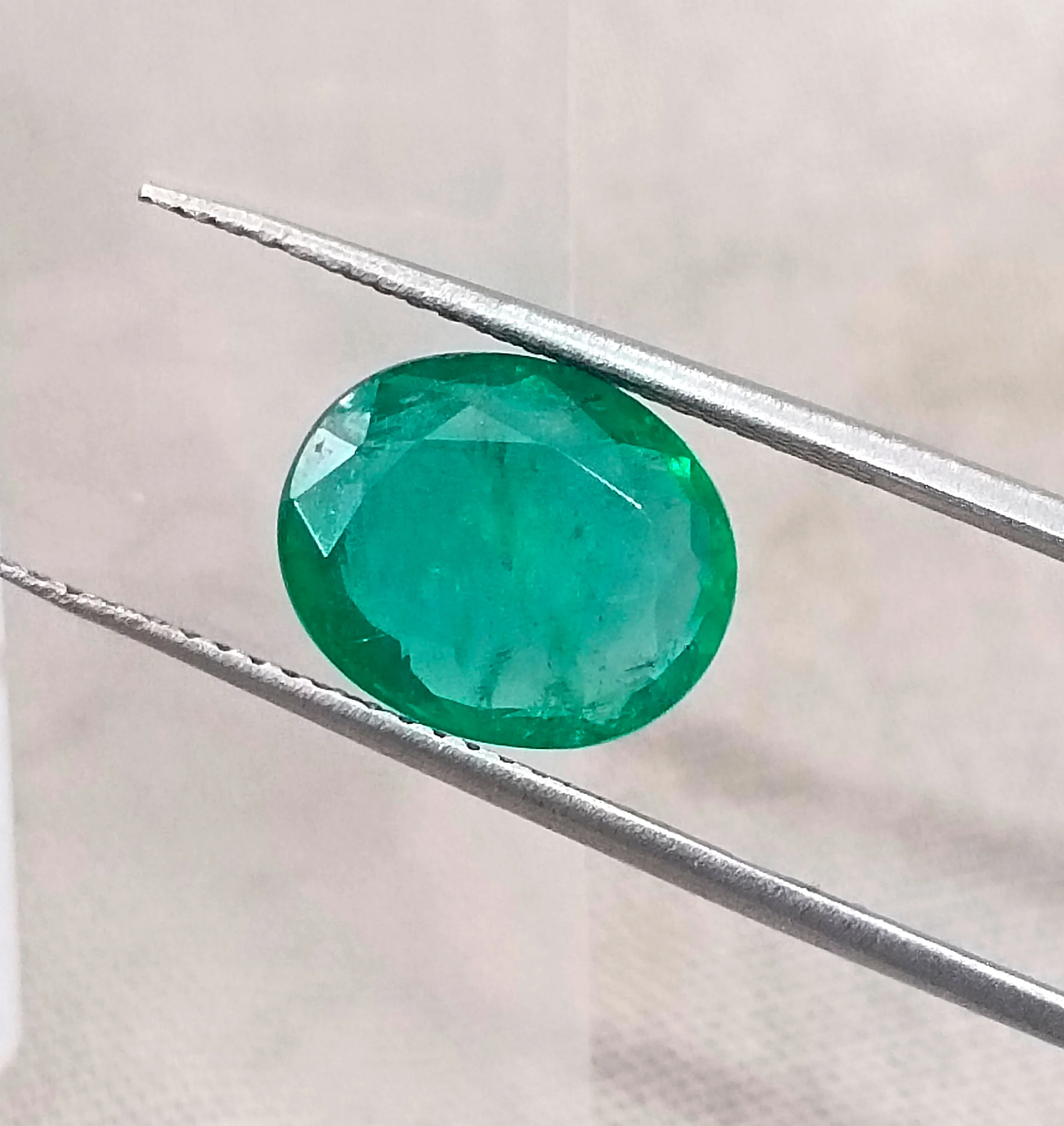 2.55ct Natural emerald alpine green oval SGL certified stone