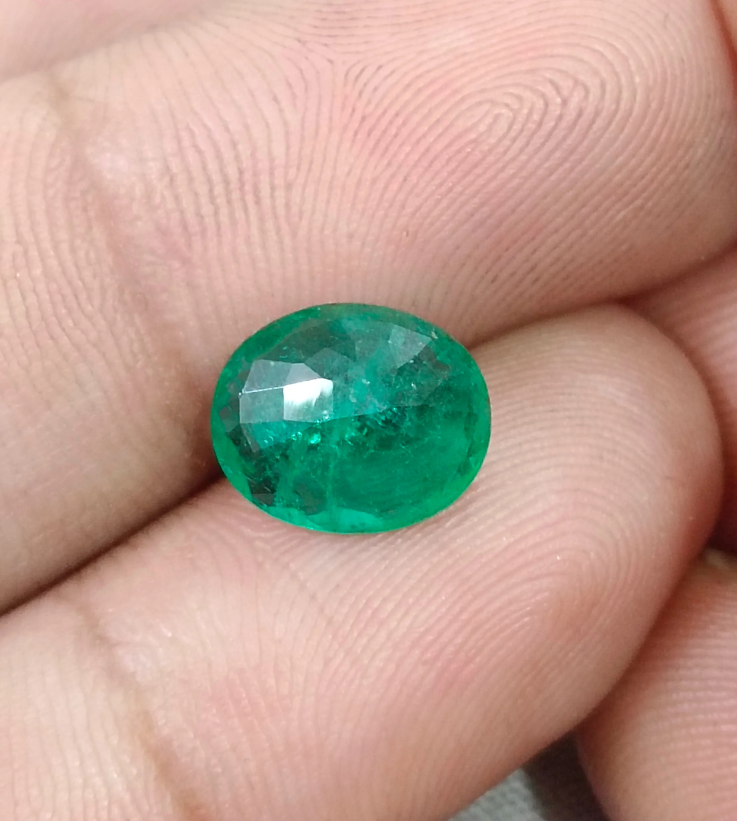 2.55ct Natural emerald alpine green oval SGL certified stone